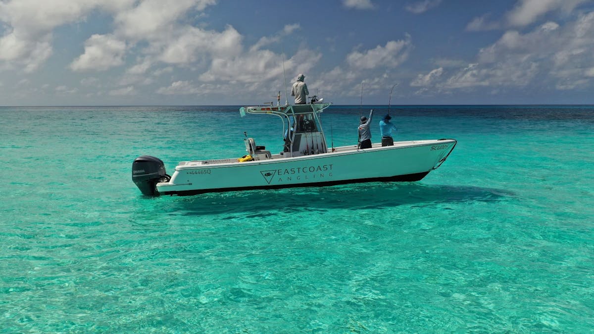 boat on crystal blue water