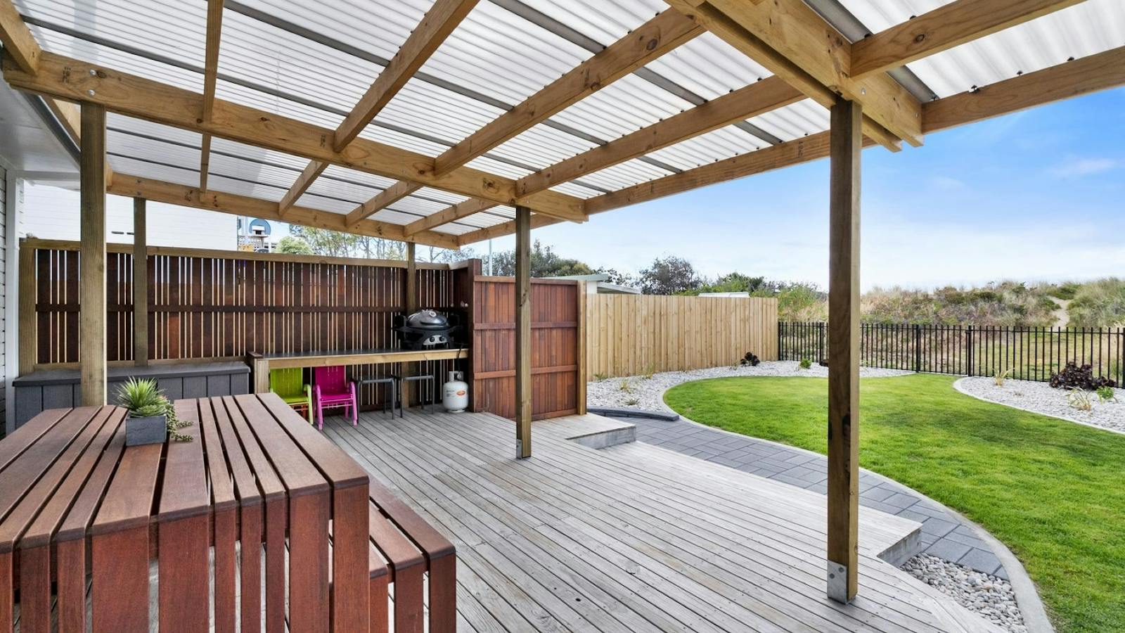 Right on the Beach with great outdoor area withBBQ
