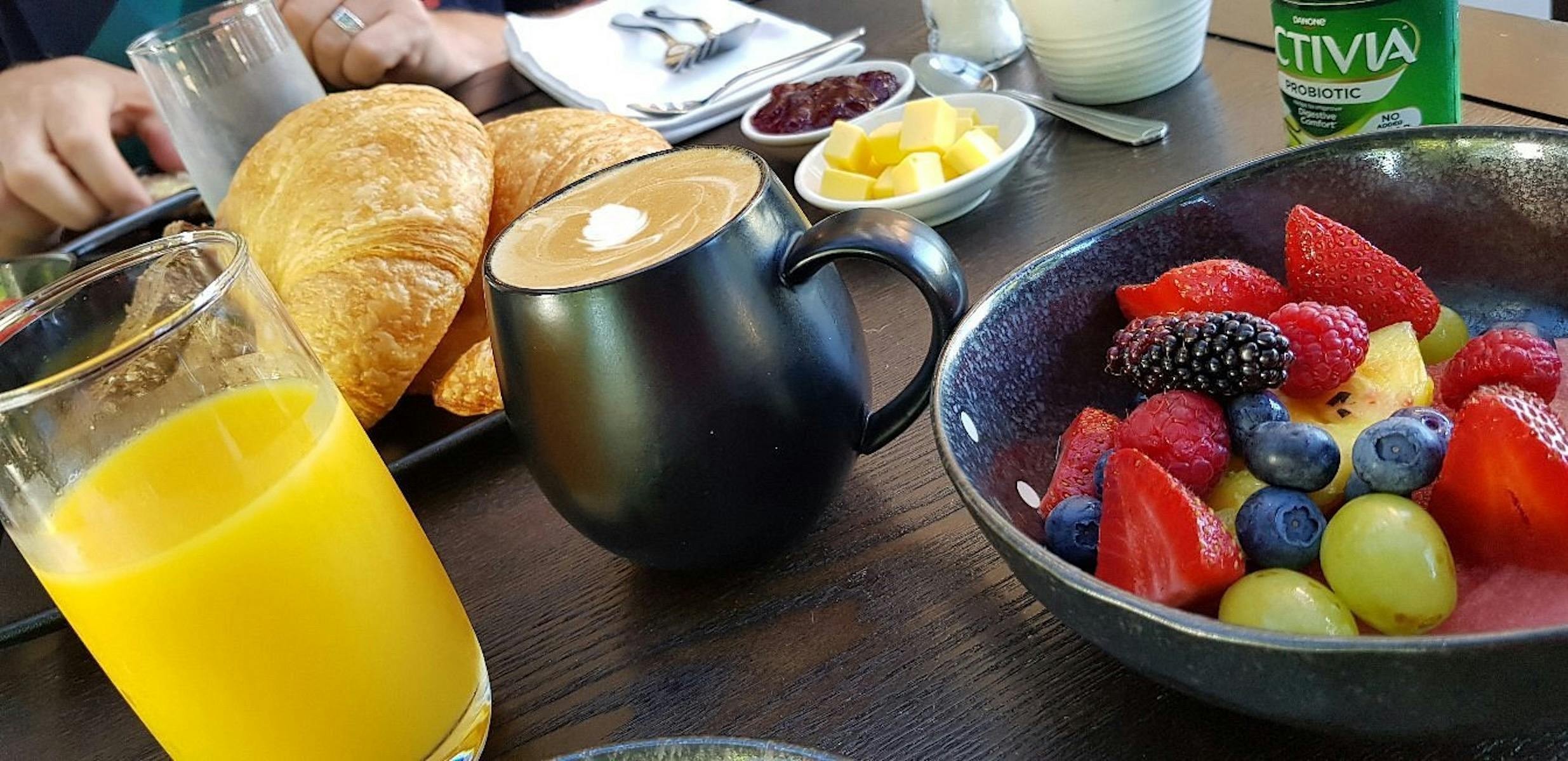 Fresh fruit, croissants, orange juice and coffee served for breakfast at Glencoe