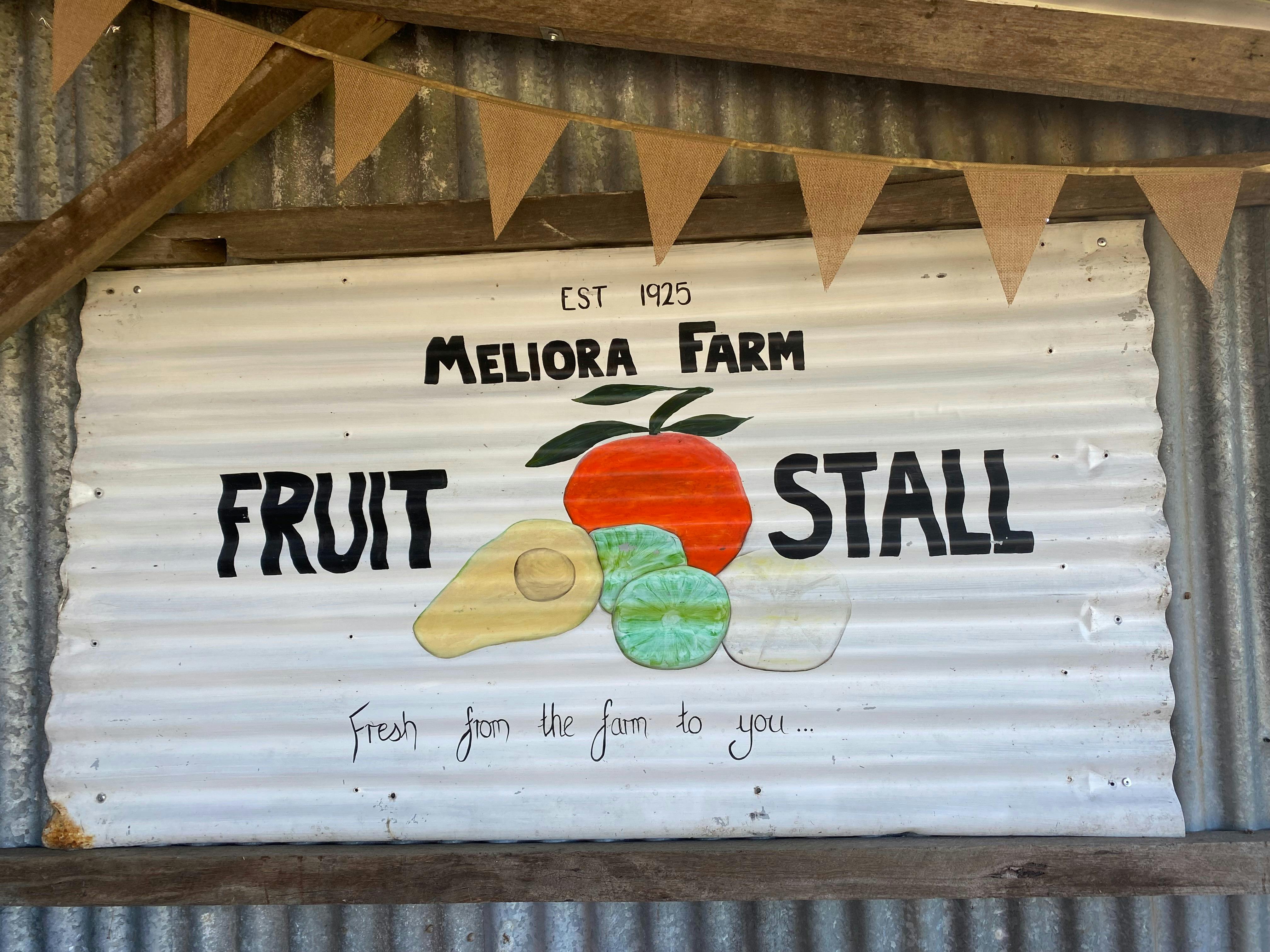 Meliora Farm fruit stall sign at welcome shed
