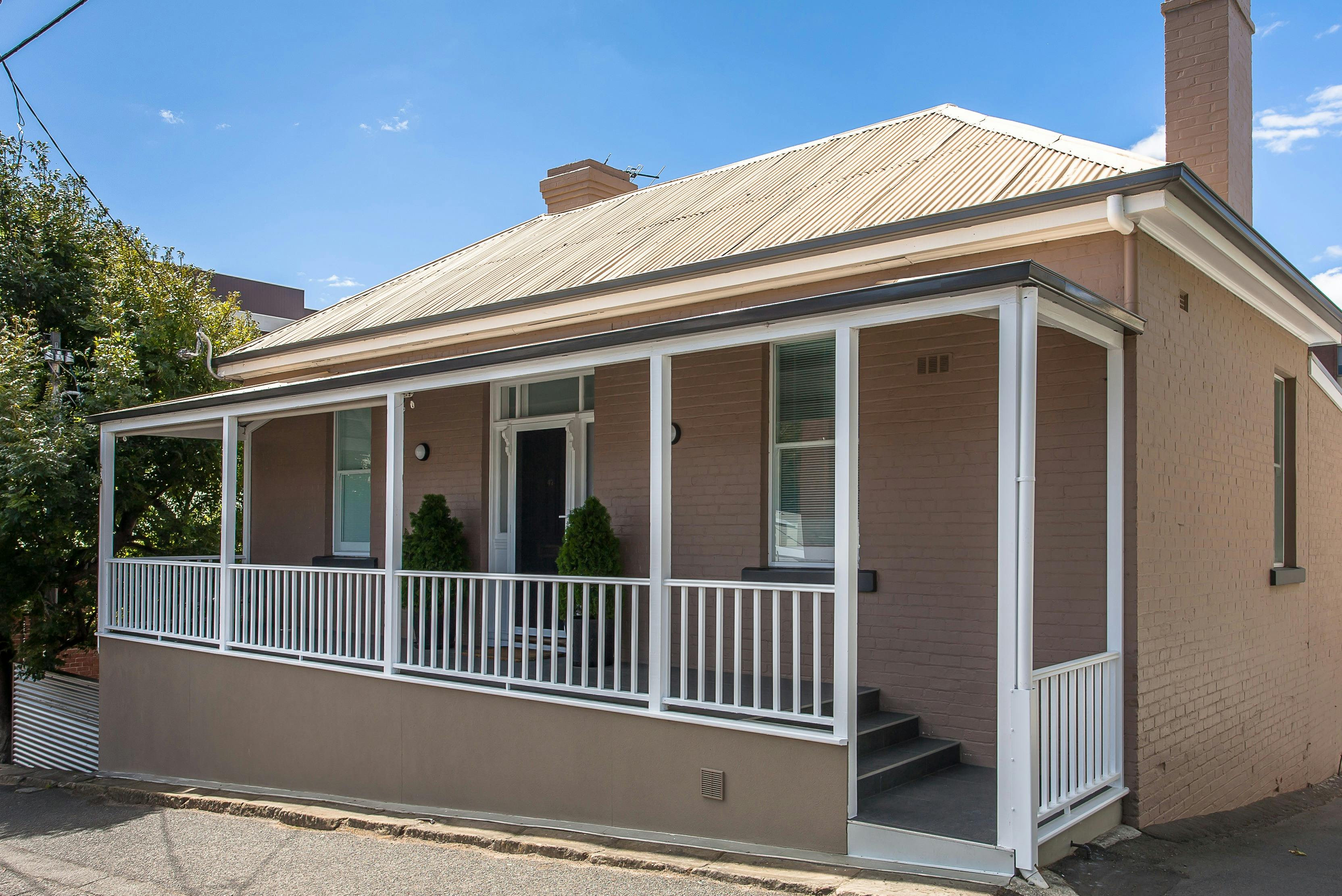 The front of your apartment showing the verandah and entry door