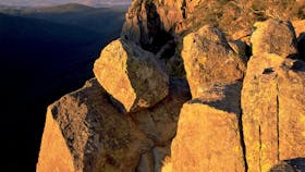 Tall granite cliffs at dusk