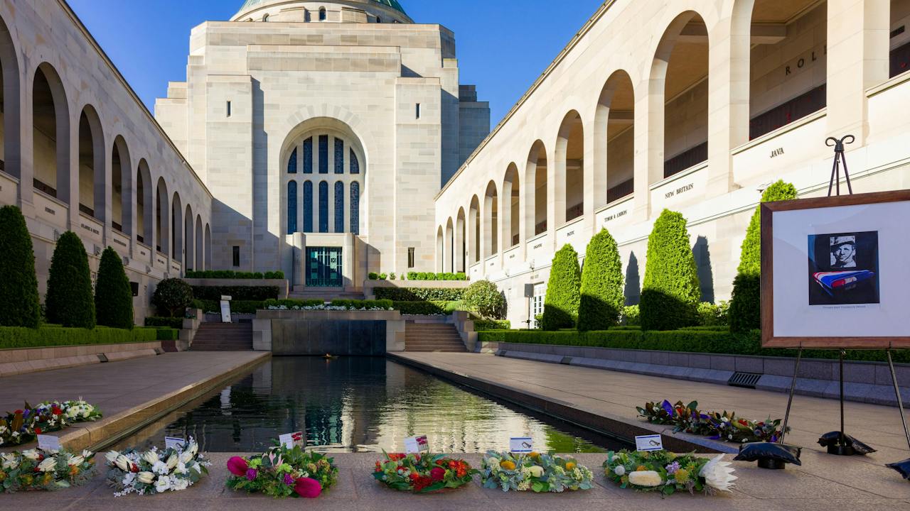 Hall of Memory and wreaths at the base of the Pool of Reflection after the ceremony.