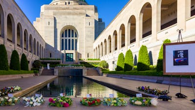 Hall of Memory in the background and wreaths at base of the Pool of Reflection.