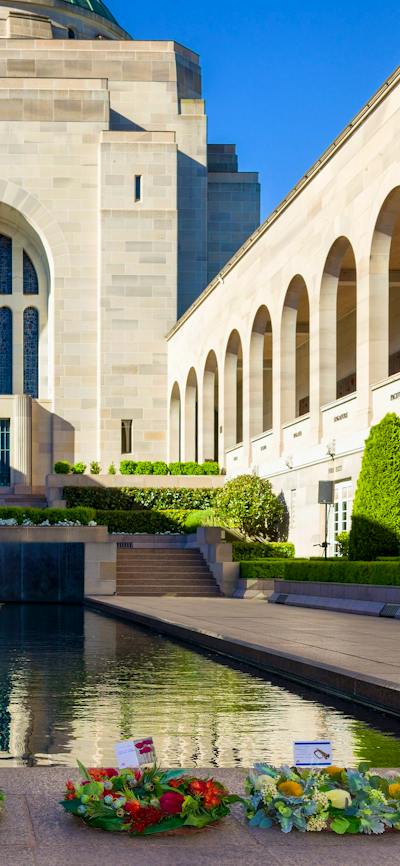 Hall of Memory in the background and wreaths at base of the Pool of Reflection.