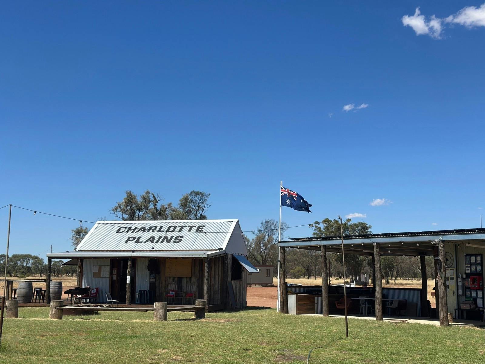 Outdoor view of the bar and Merch Hut at the Bore Campsite, Charlotte Plains, Outback Queensland