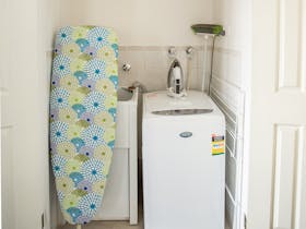 Laundry facilities in each cottage