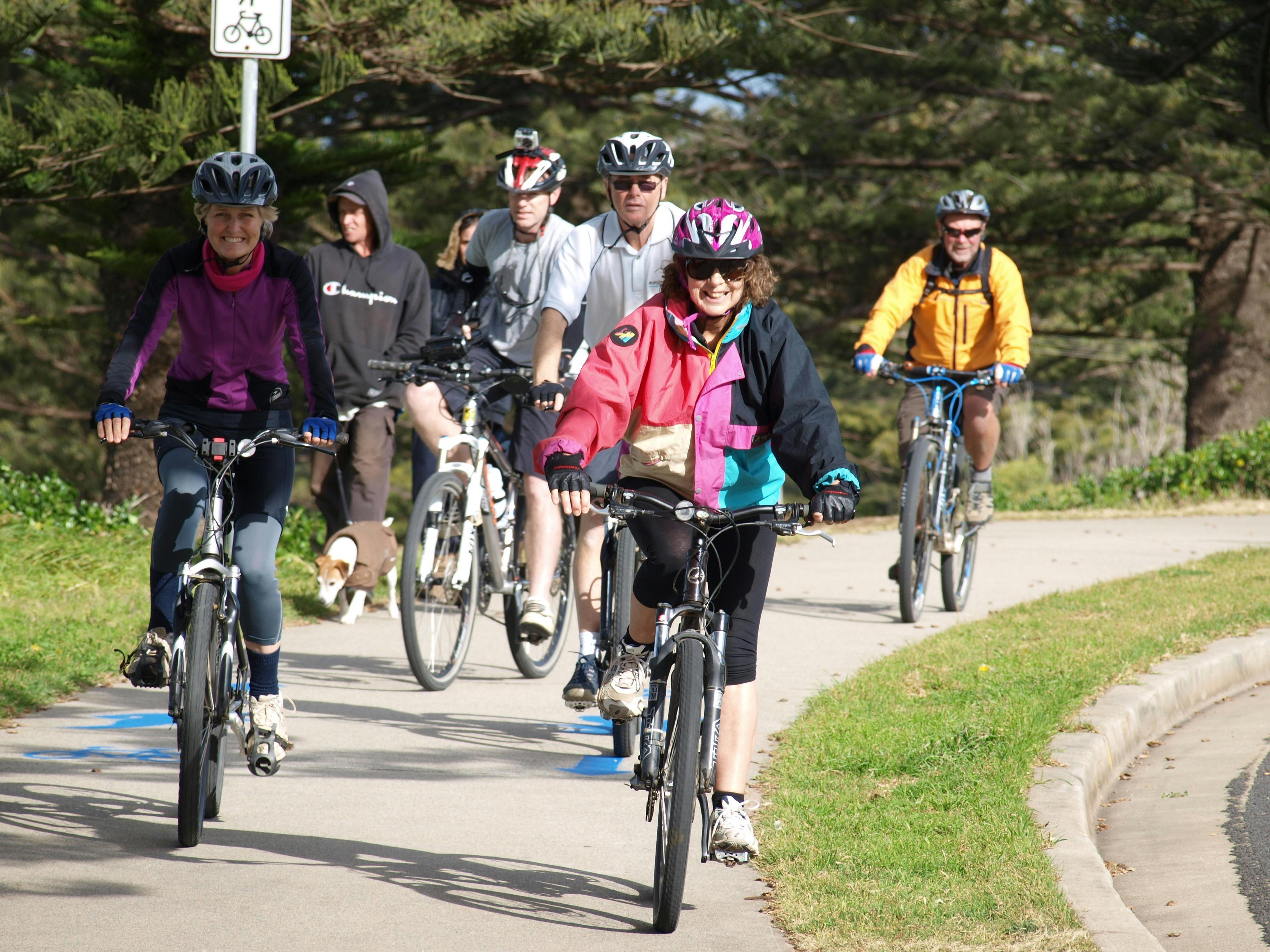 A group of cyclists on a bike path at Tuross Head