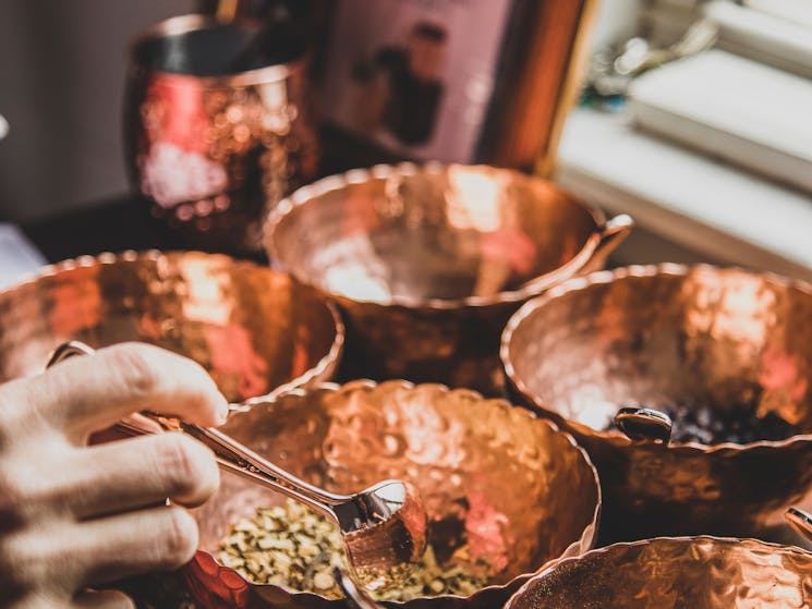 copper bowls with spices