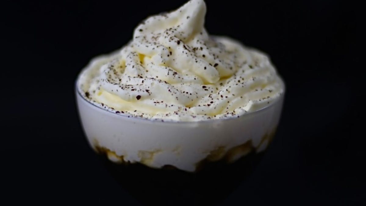 Espresso martini topped with a salted vanilla, pandan and saffron mousse