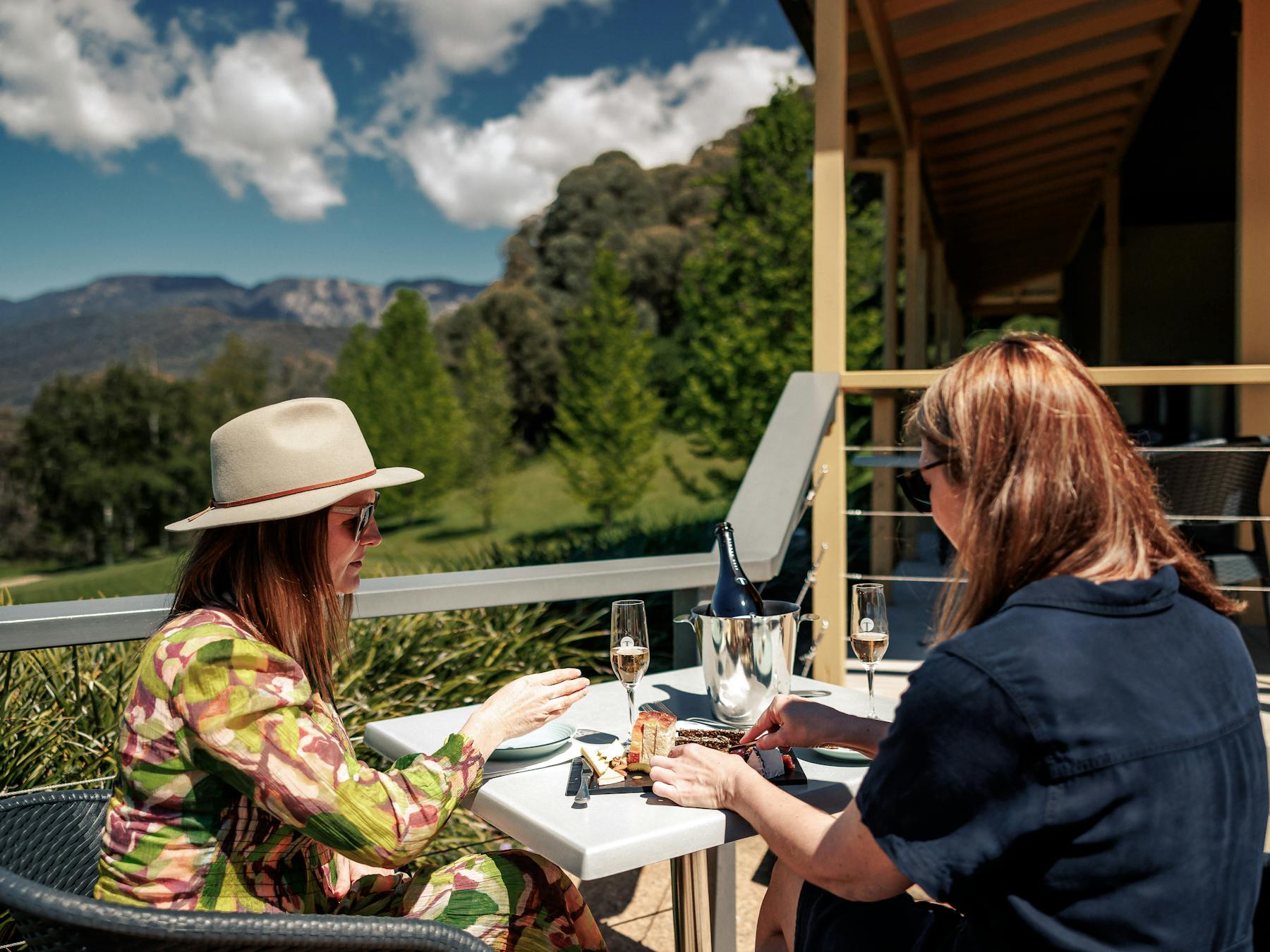 two women drinking wine at Ringer Reef Winery