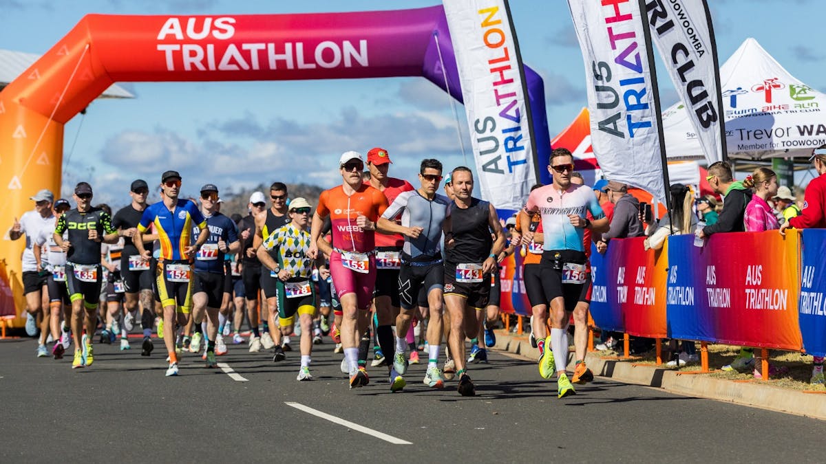 Wellcamp Duathlon Runners under finisher line