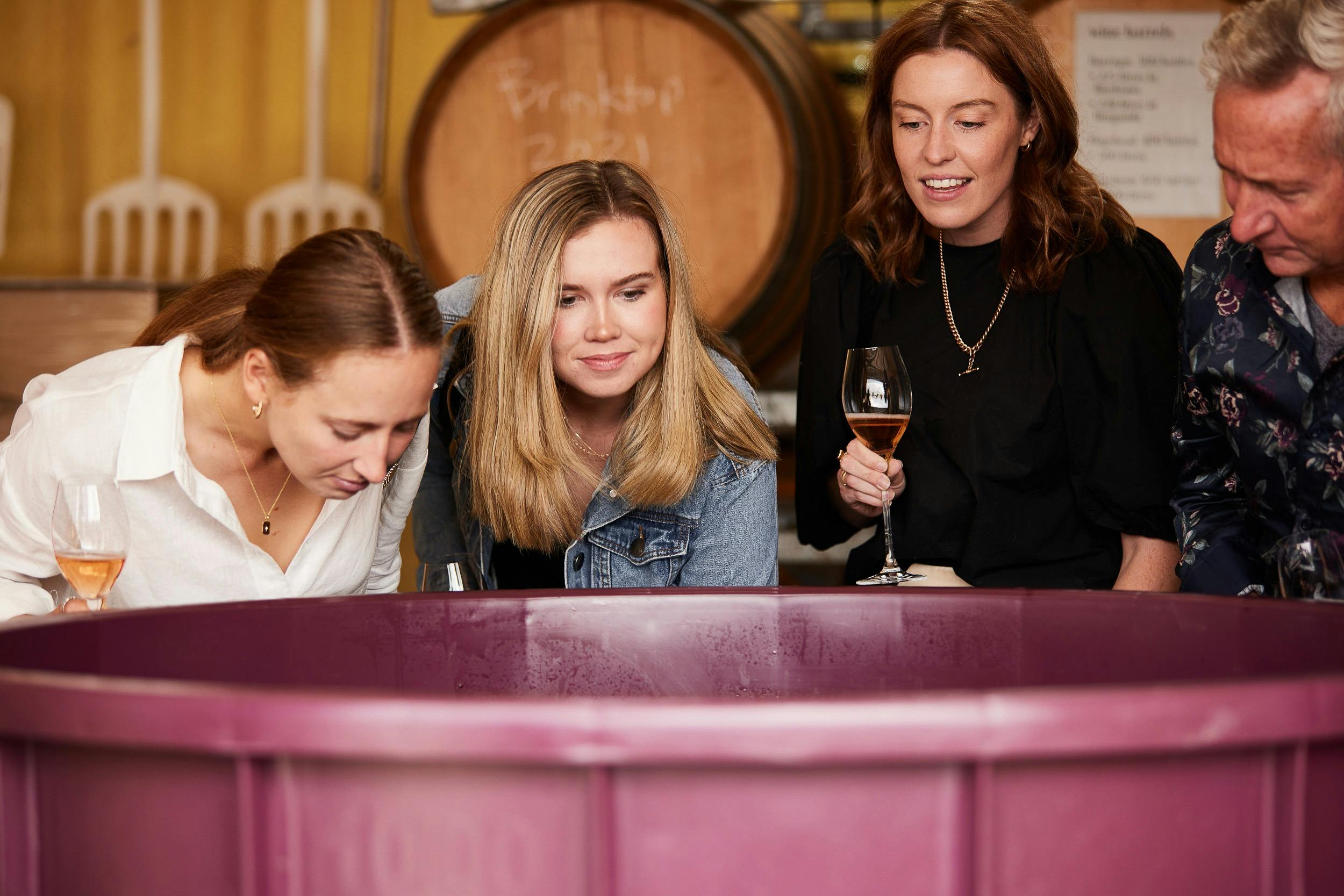 Smelling the wine fermenting
