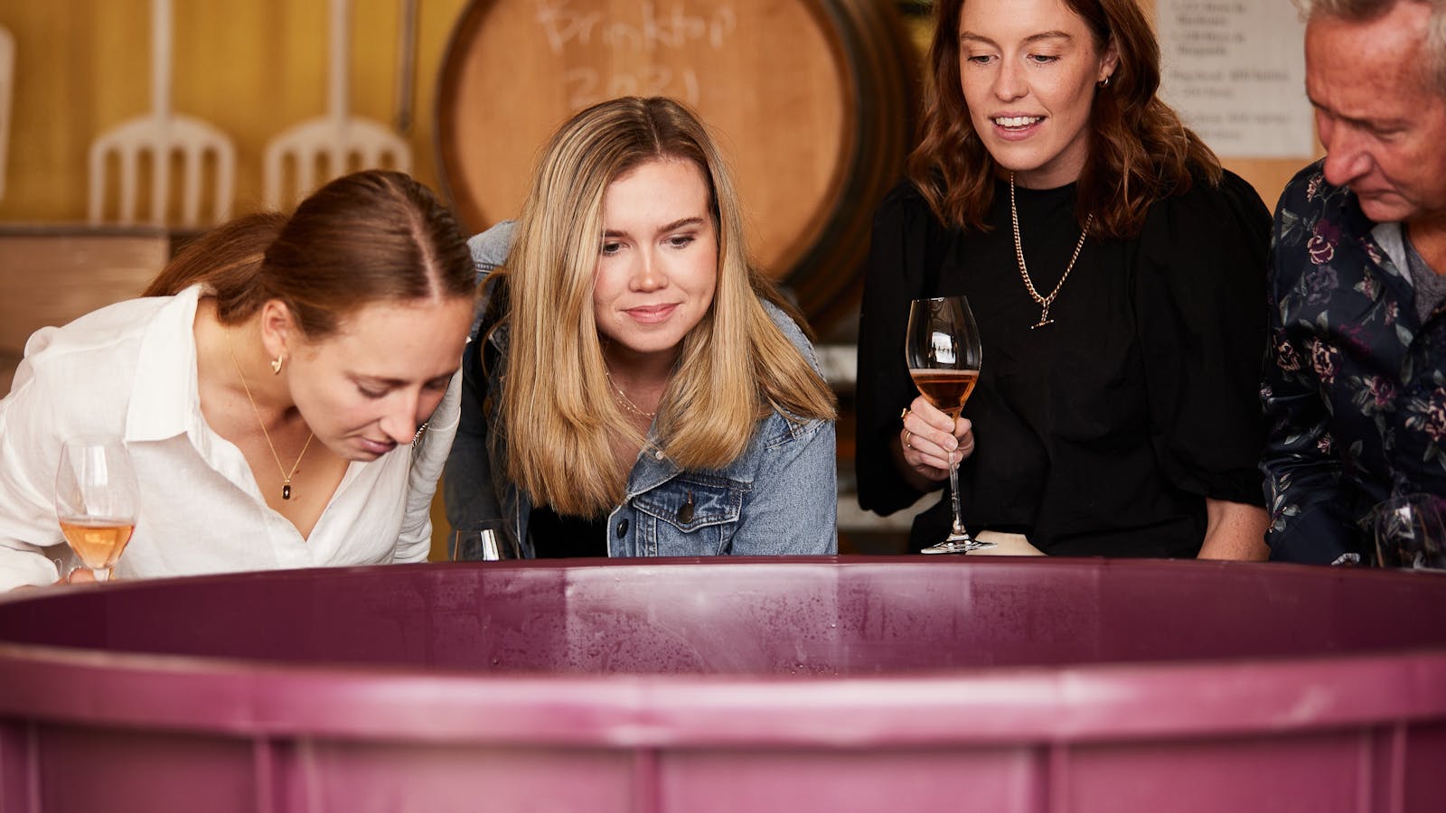 Smelling the wine fermenting