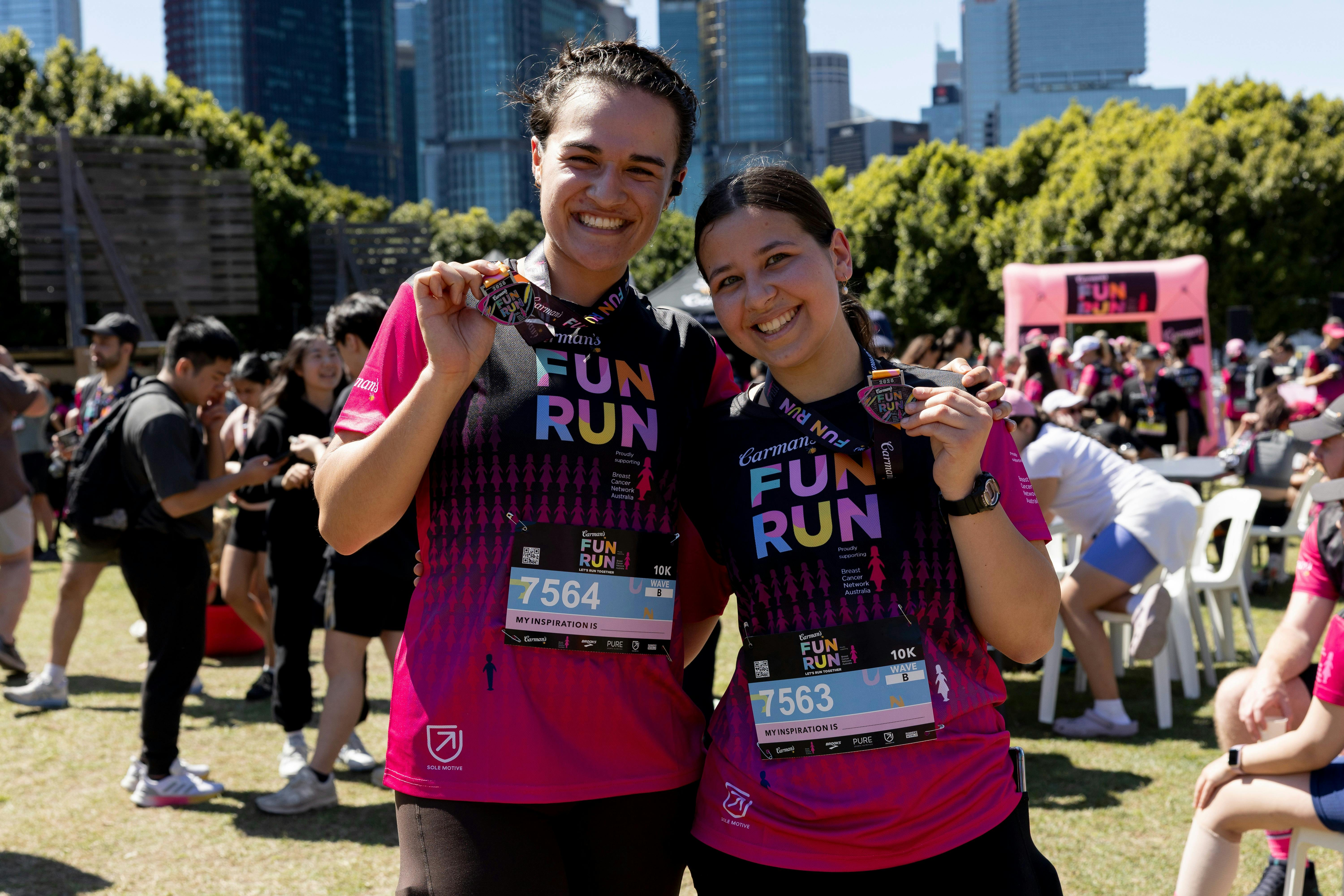 Participants smiling with medals