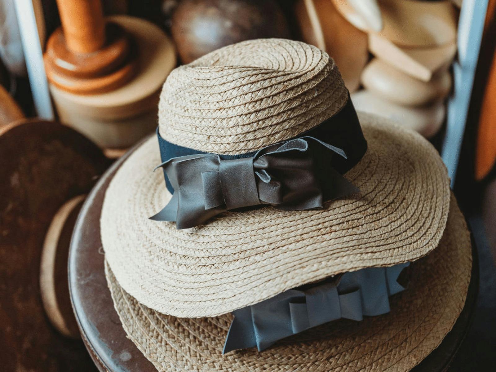 Julie Herbert Millinery with straw hats and hat blocks