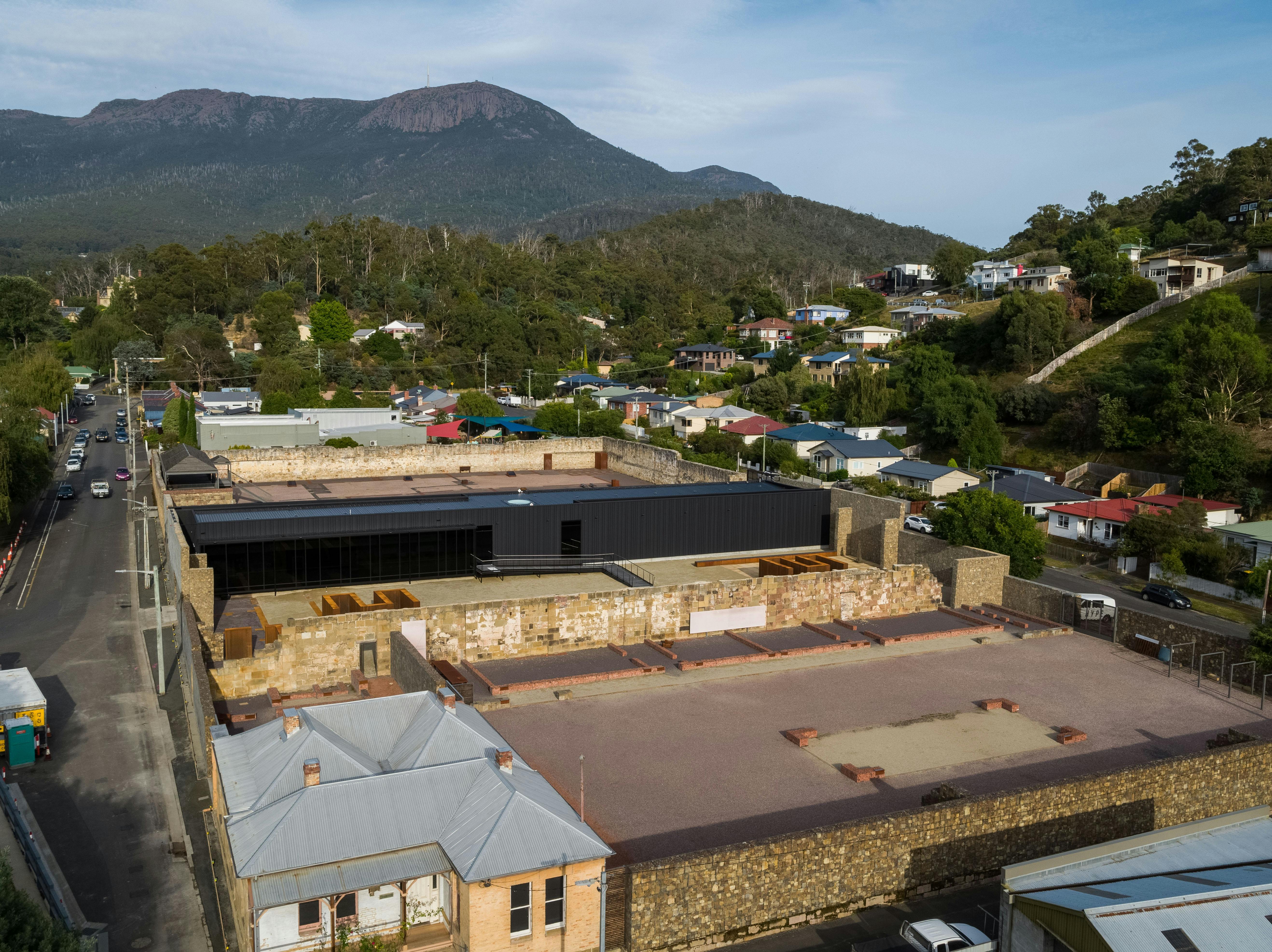 An aerial shot of the Cascades Female Factory with Mt Wellington as the background.