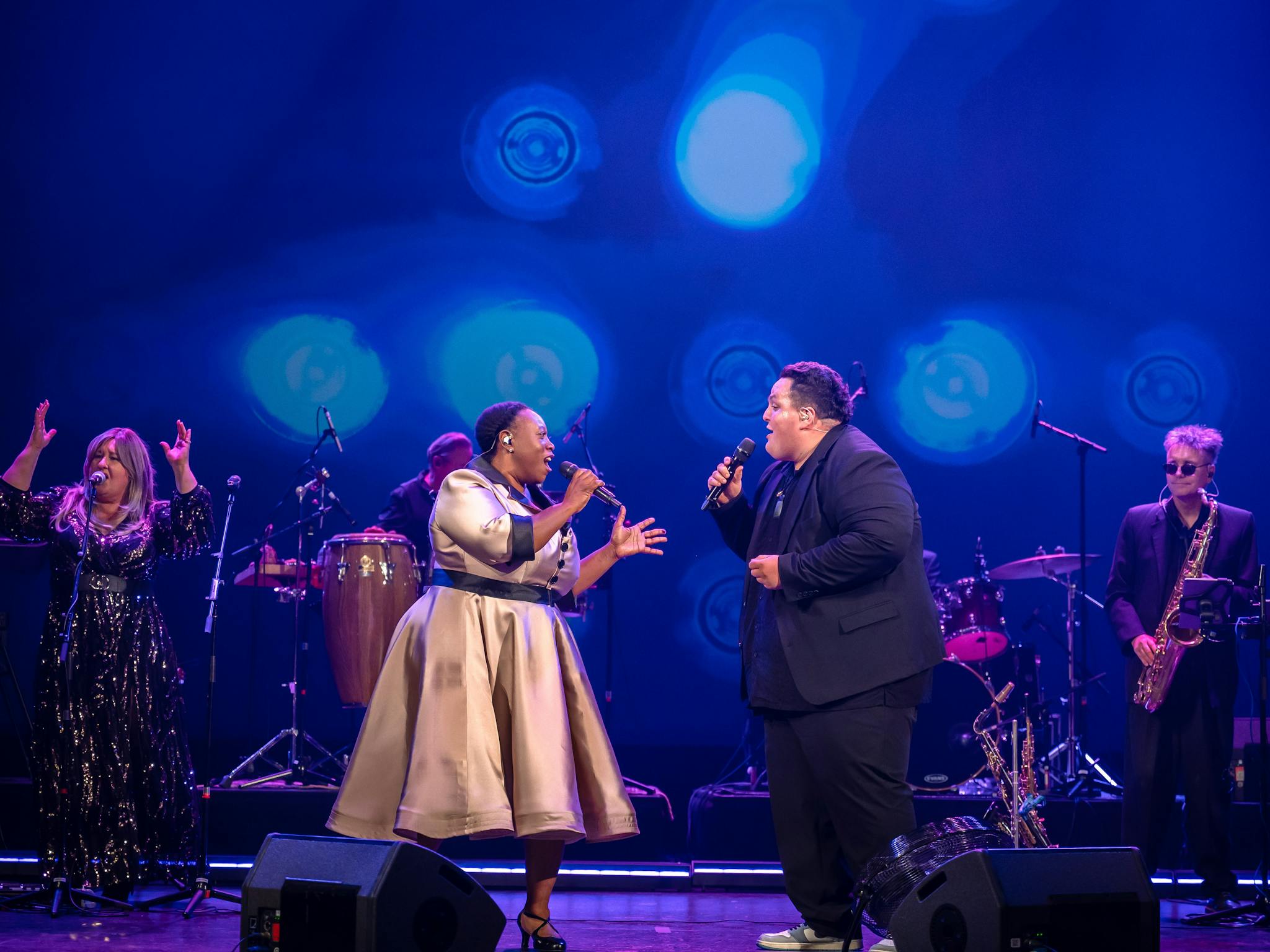 Photo of Judah Kelly & Asabi Goodman singing duet in The Big Chillout Photo of Judah Kelly & Asabi Goodman singing duet in The Big Chillout