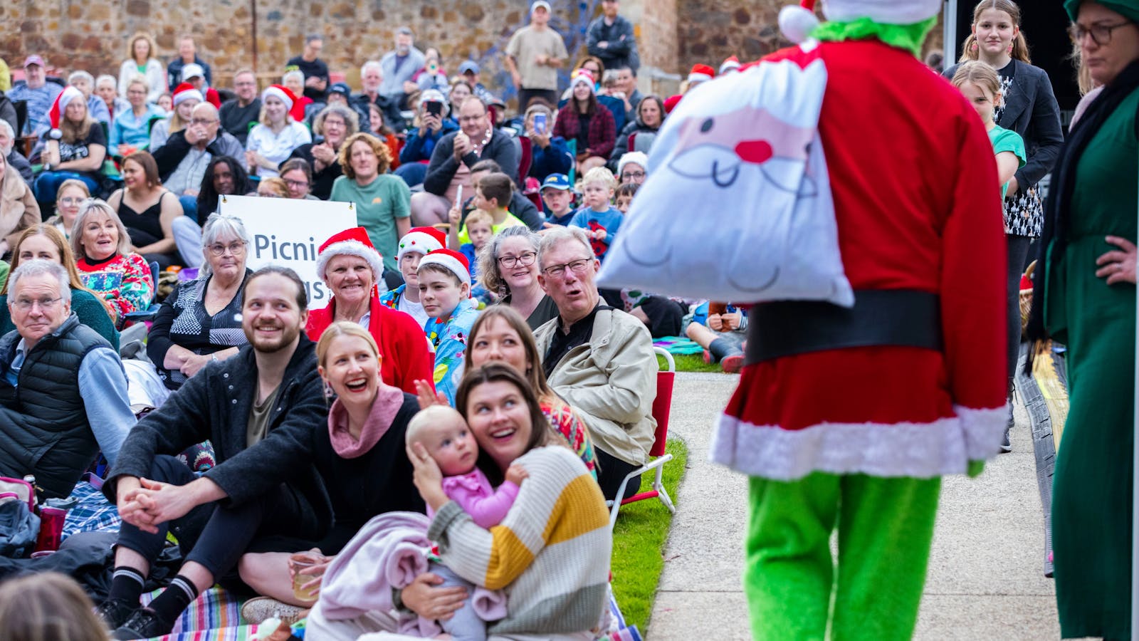 Crowd enjoying the festivities at Swinging Christmas 2023 at Rosny Farm