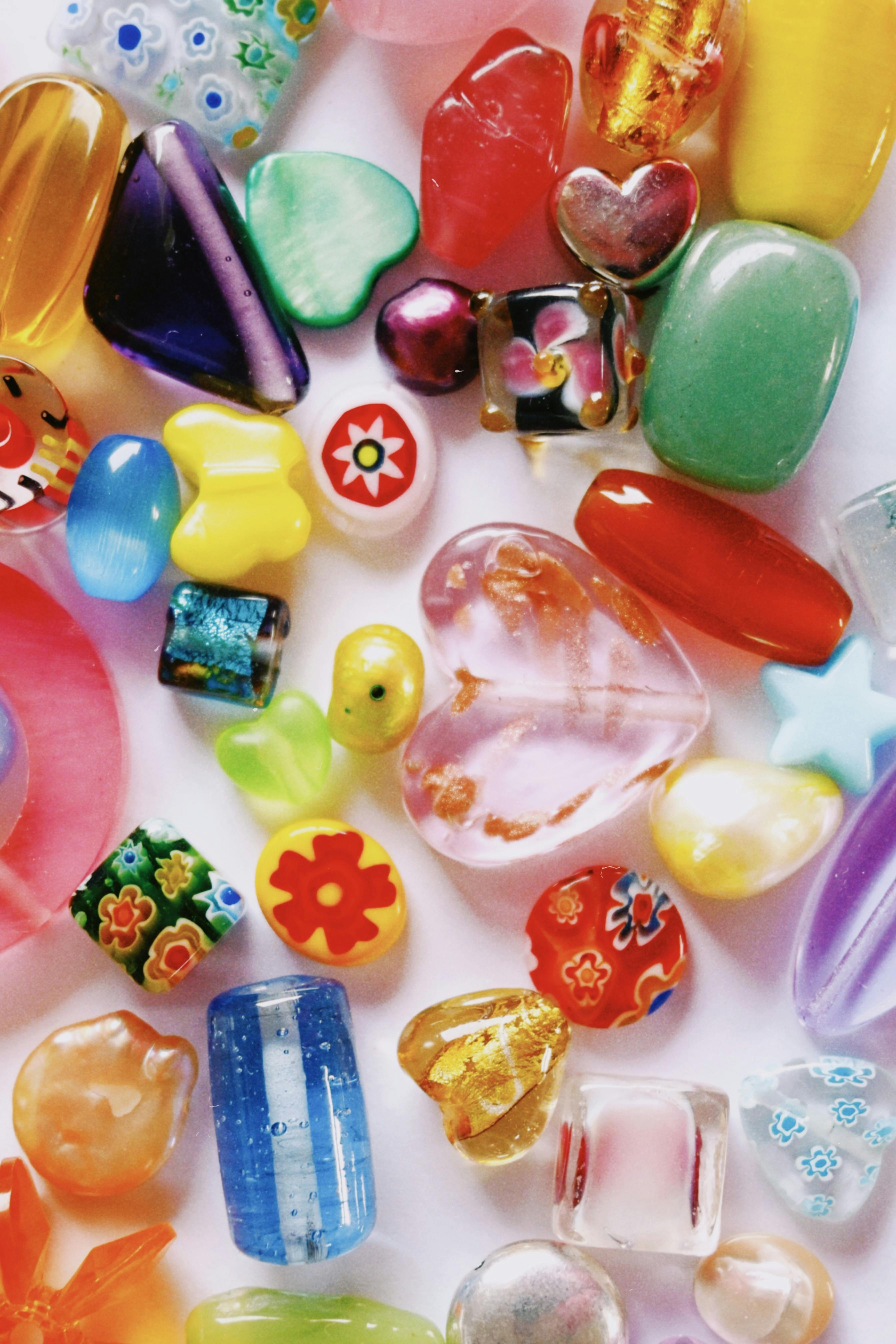 a close up photo of colourful glass beads