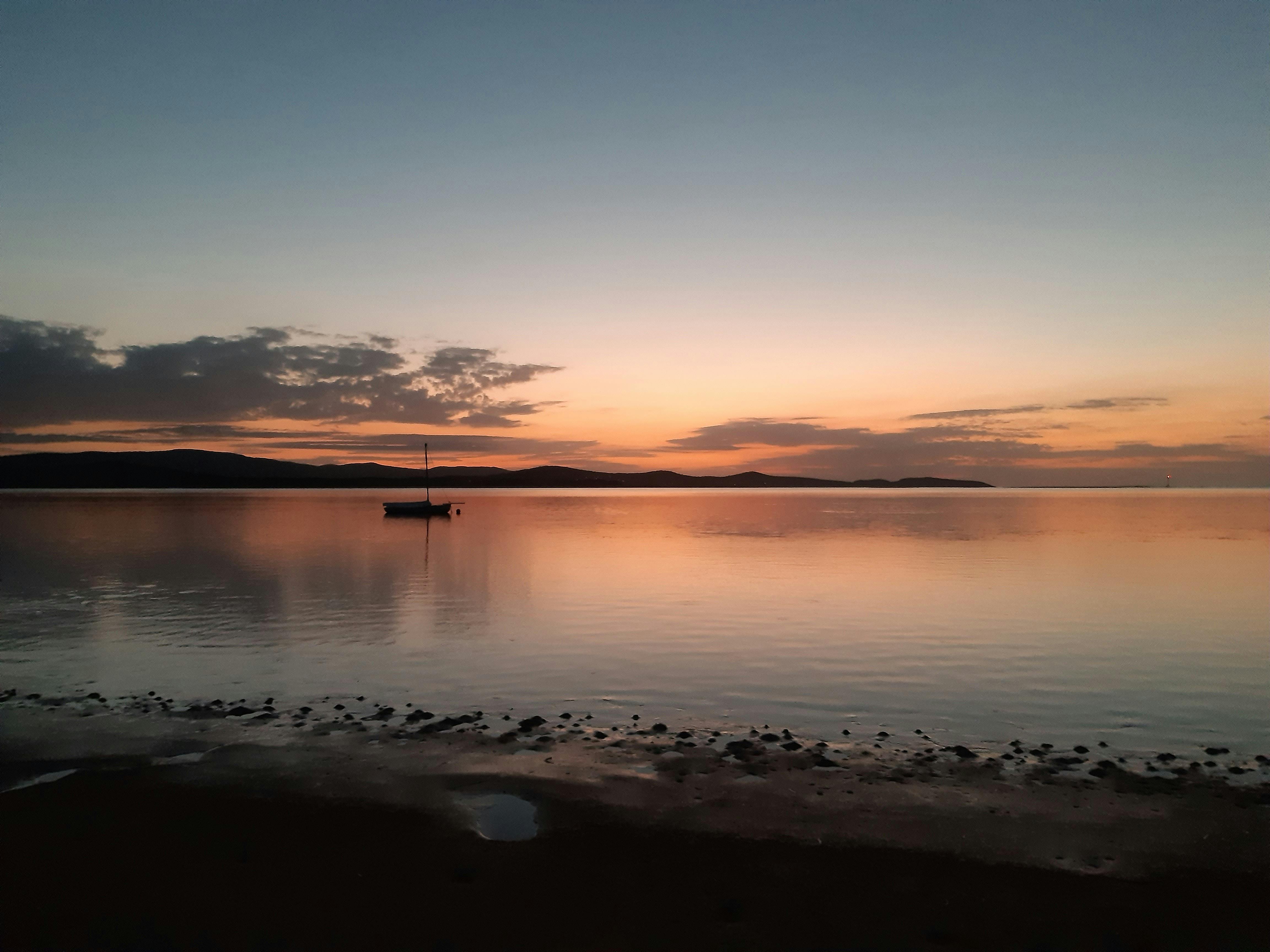 Walk to the beach and enjoy sunsets over the water.