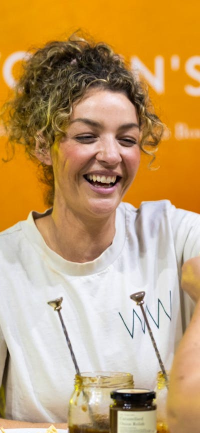 Women's Work serving a customer