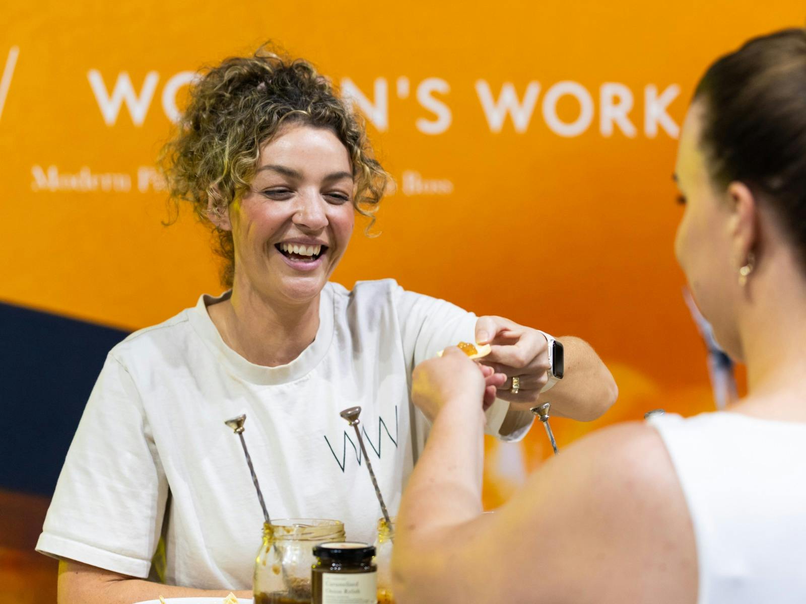 Women's Work serving a customer