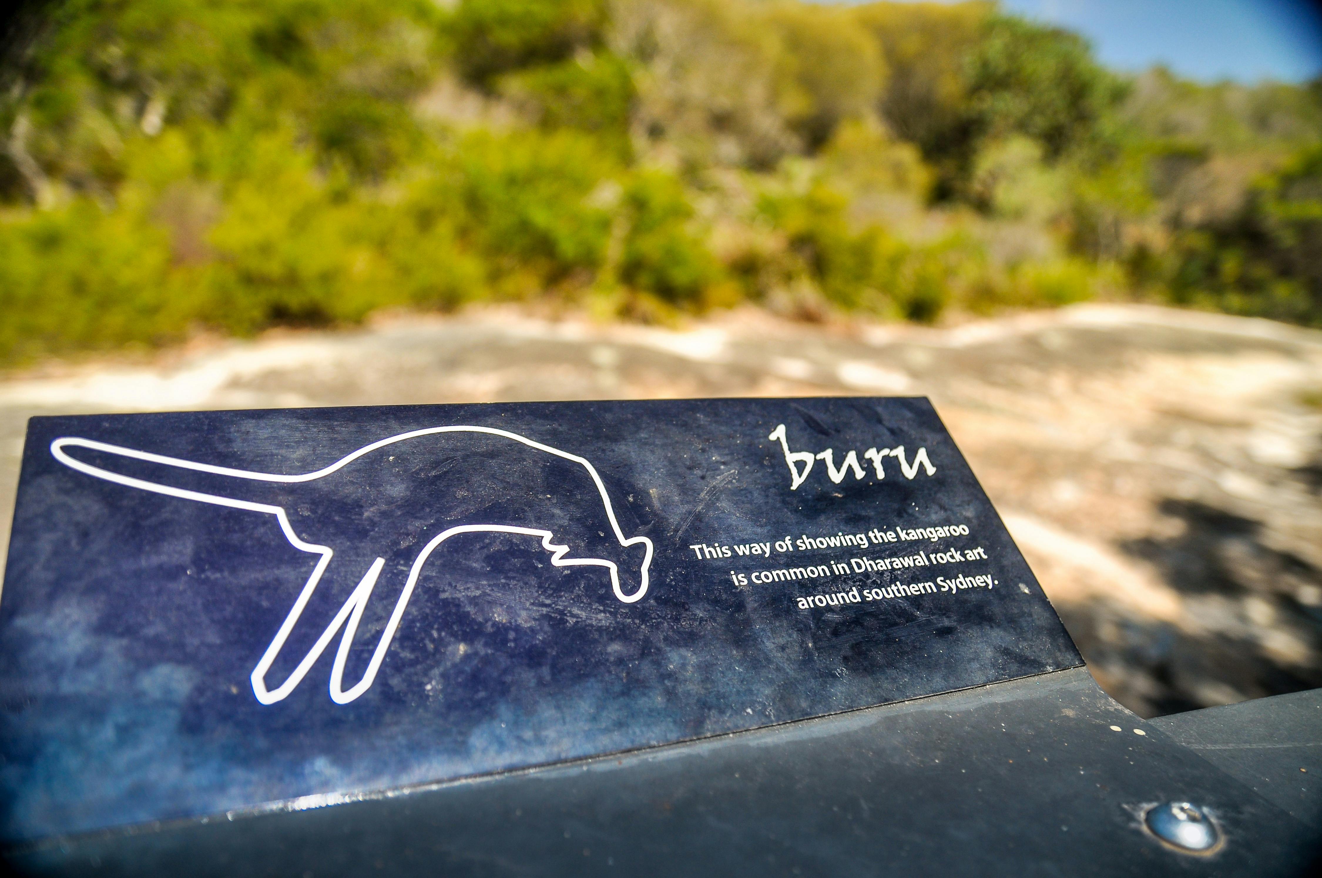 Plaque explaining the aboriginal engraving