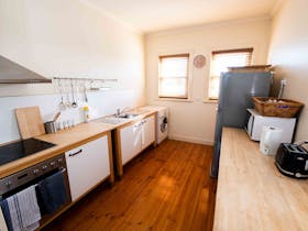 Shared kitchen. Includes complimentary breakfast as a cook your own option