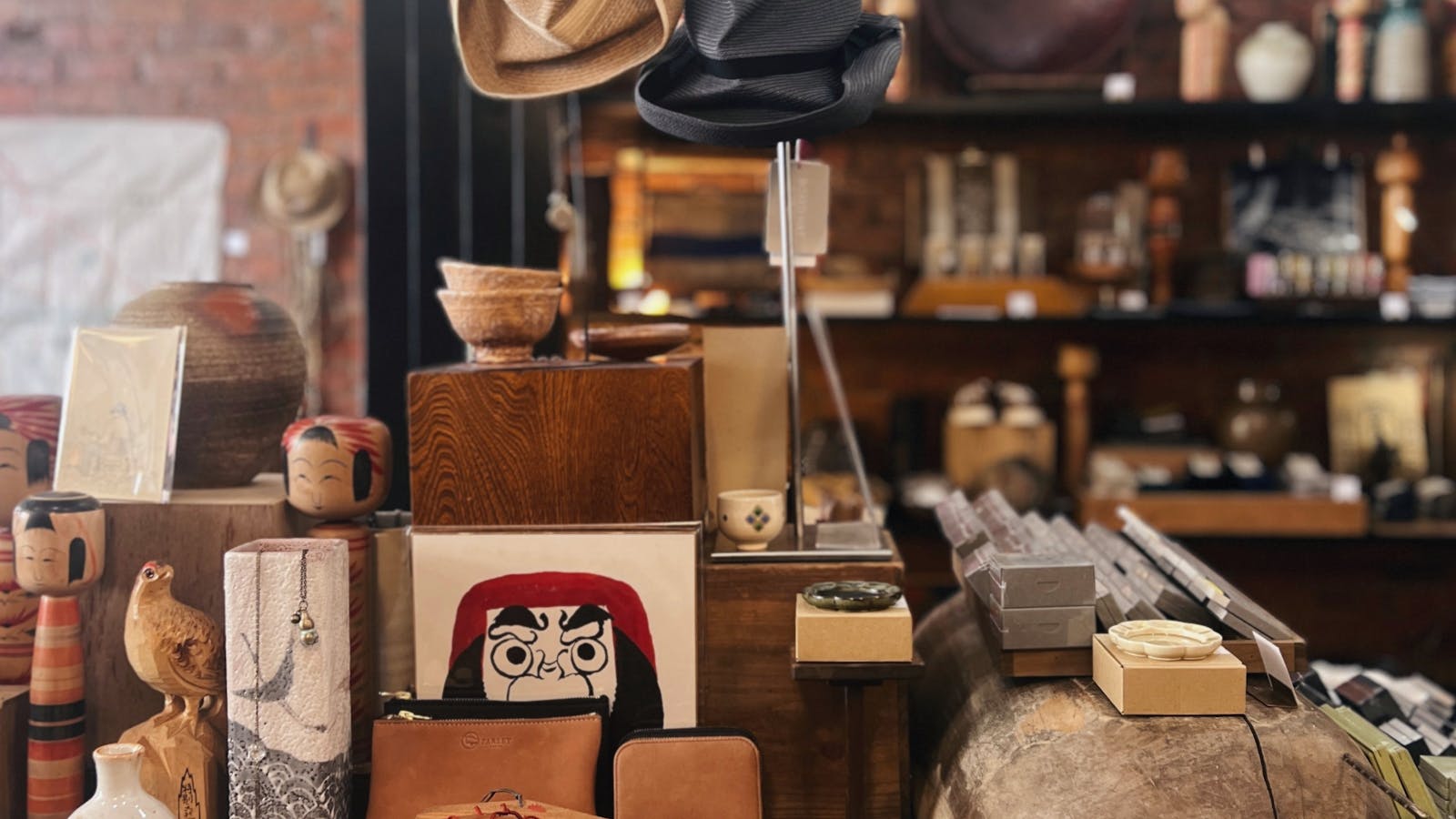 Unique vintage ceramics and wooden treasures sit happily alongside contemporary jewellery and hats
