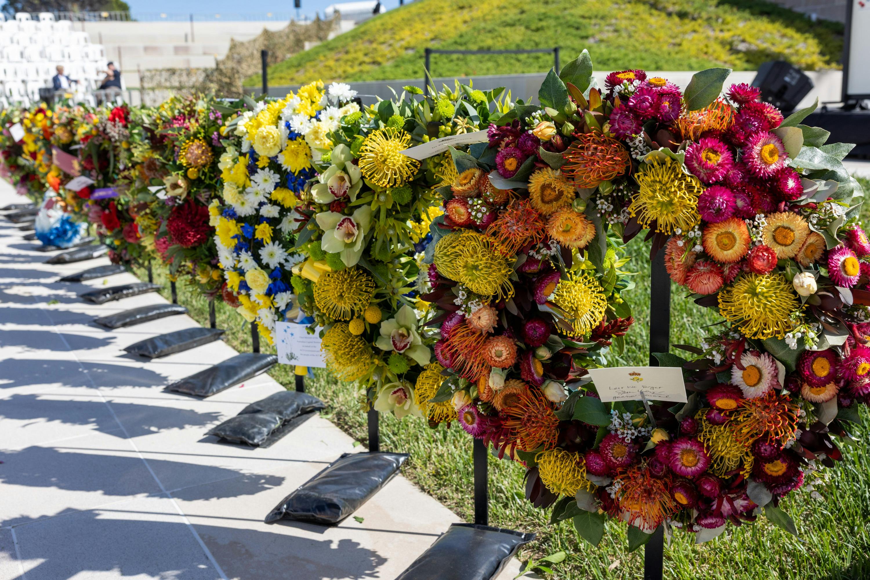 Floral wreaths lined up before the ceremony