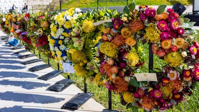 Floral wreaths lined up before the ceremony