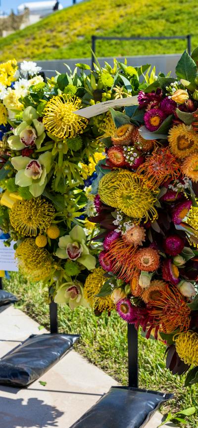 Floral wreaths lined up before the ceremony