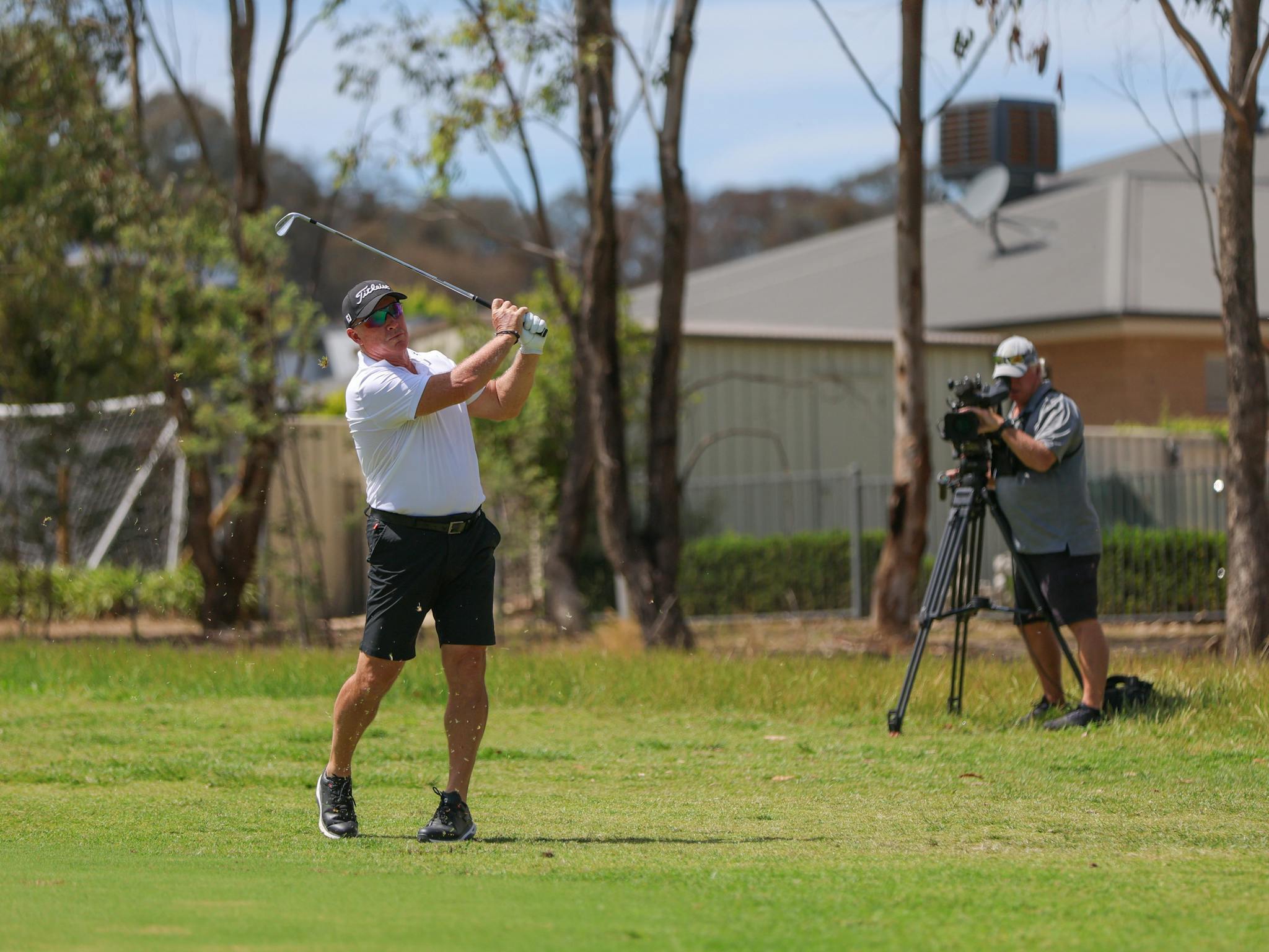 Peter Lonard hitting a golf shot on the fairway
