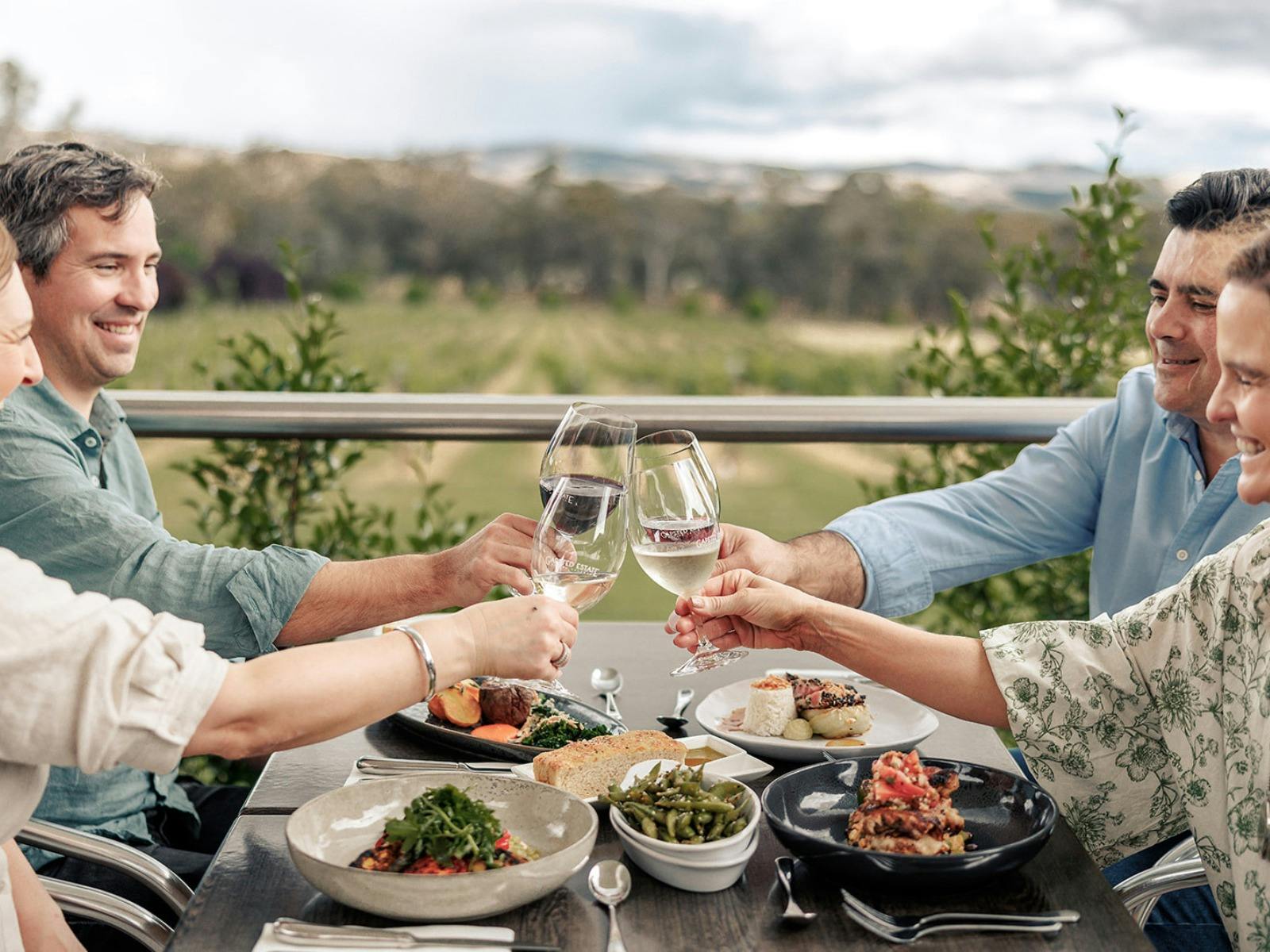 Enjoy a meal with the backdrop of vineyards over looking the striking Alpine Valleys