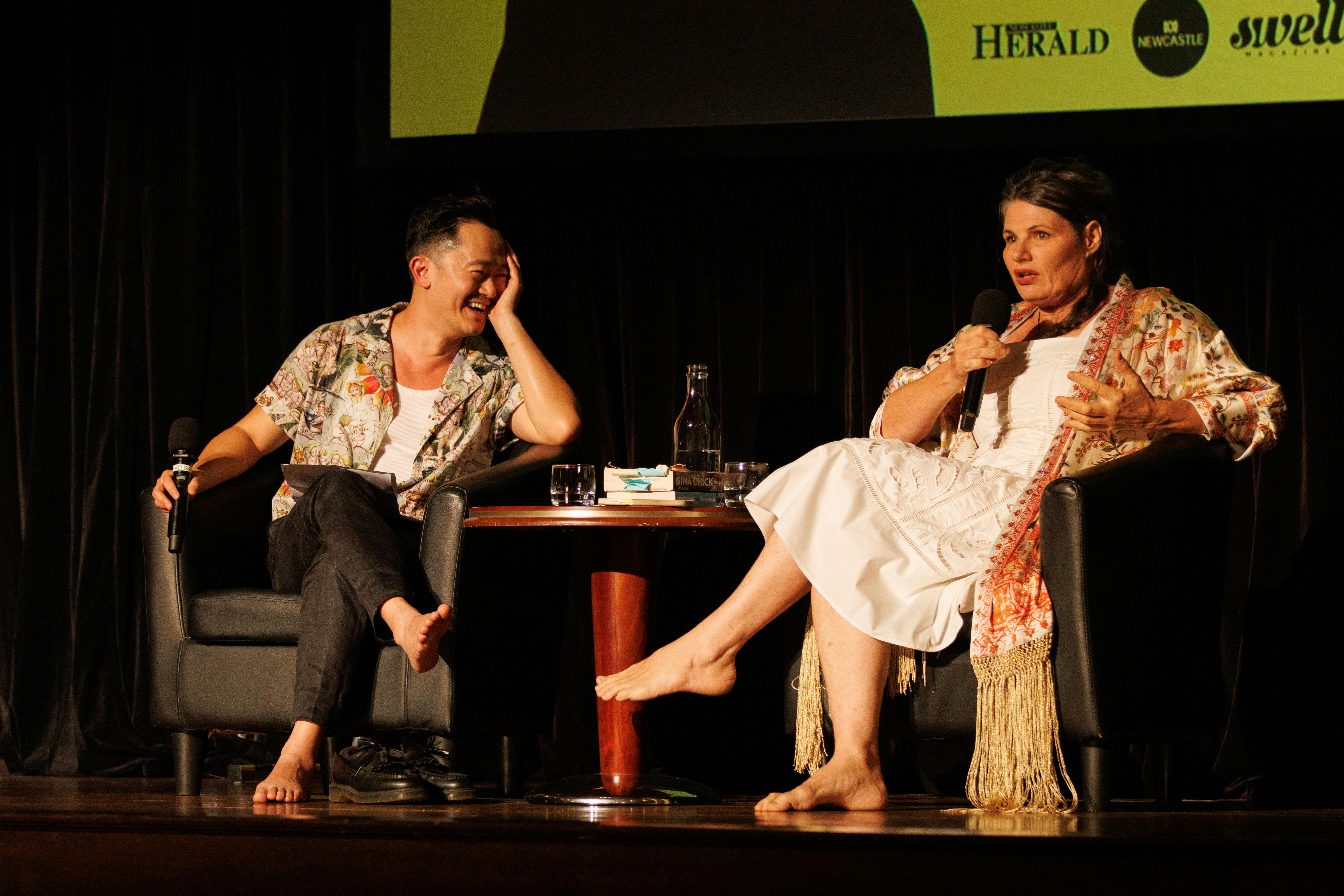 Benjamin Law is laughing as Gina Chick responds to a question.