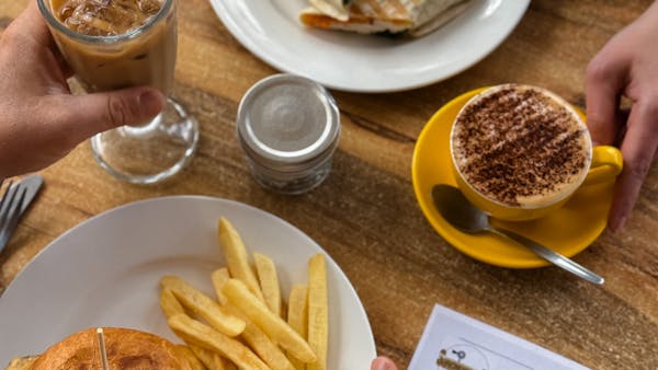 Burger and wrap with coffees