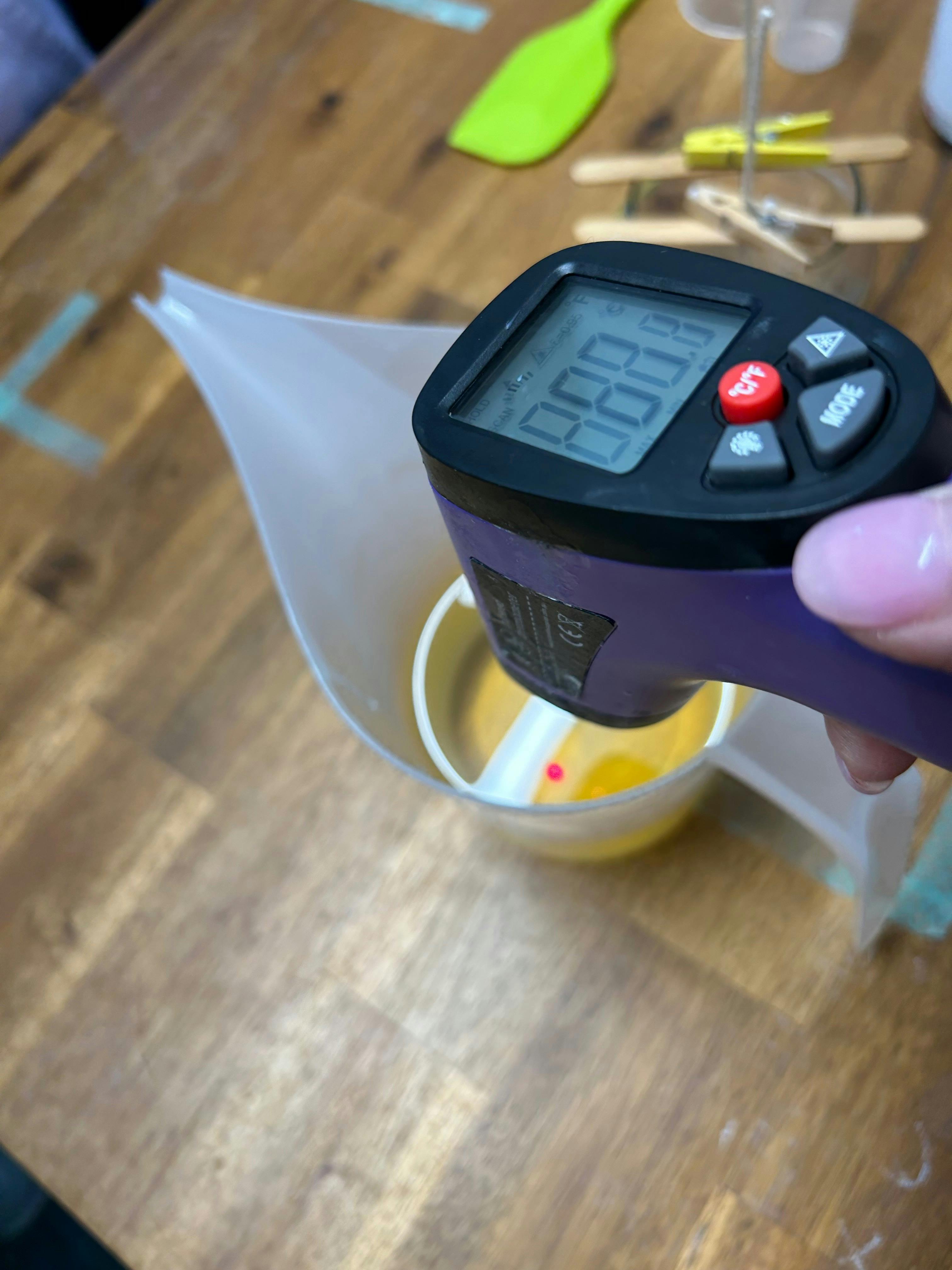 Infrared Thermometer is really important. Fragrance can't be added unless wax is 60 degrees or less.