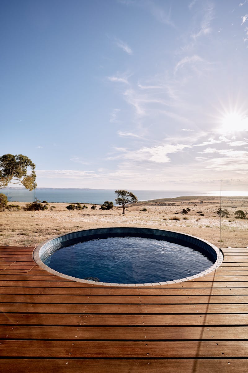 The pool overlooking the farm and the ocean with Kangaroo Island in the distance