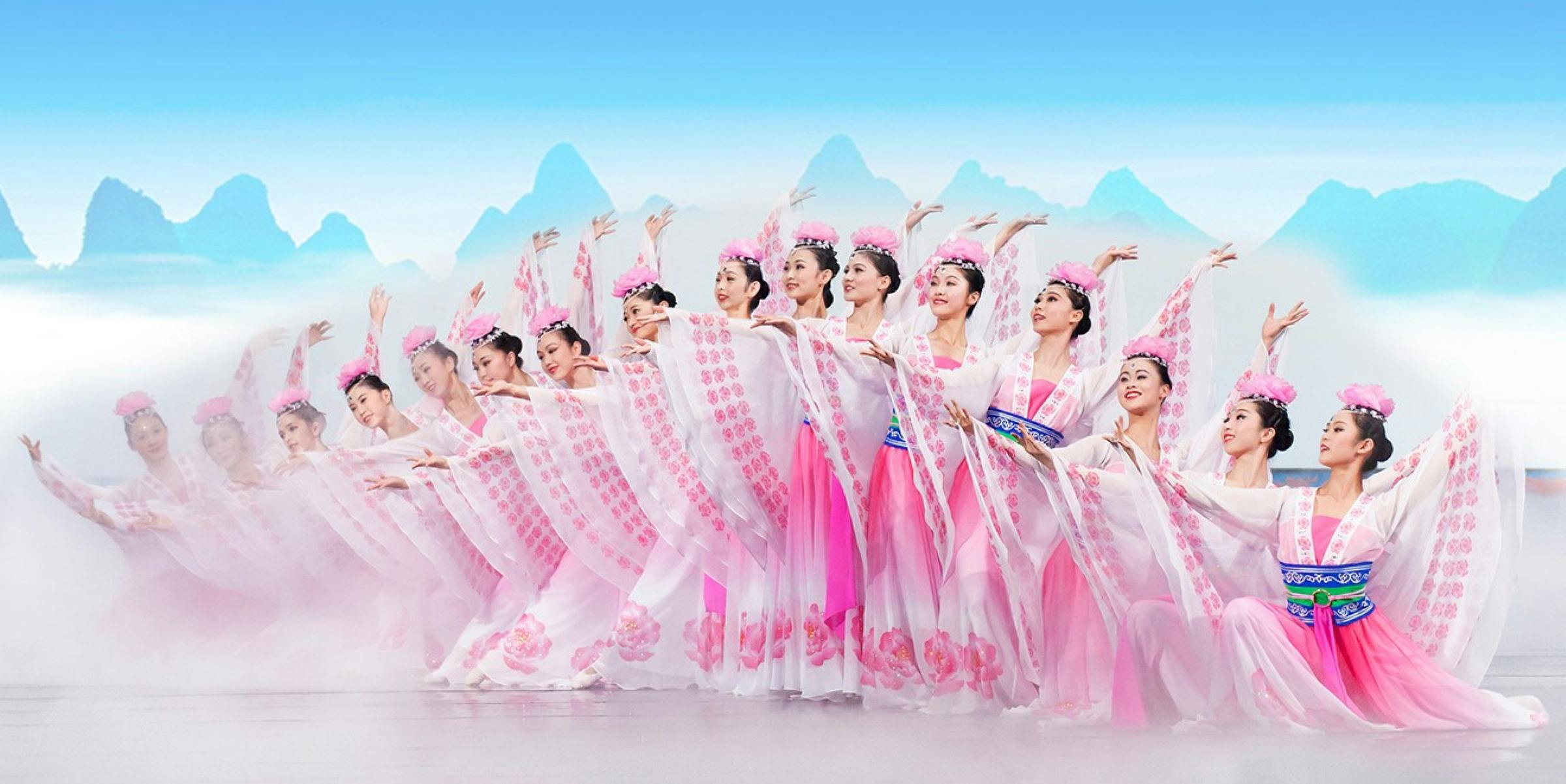 Classical chinese dance depicting a heavenly scene, with women dancers posing in a fan pattern