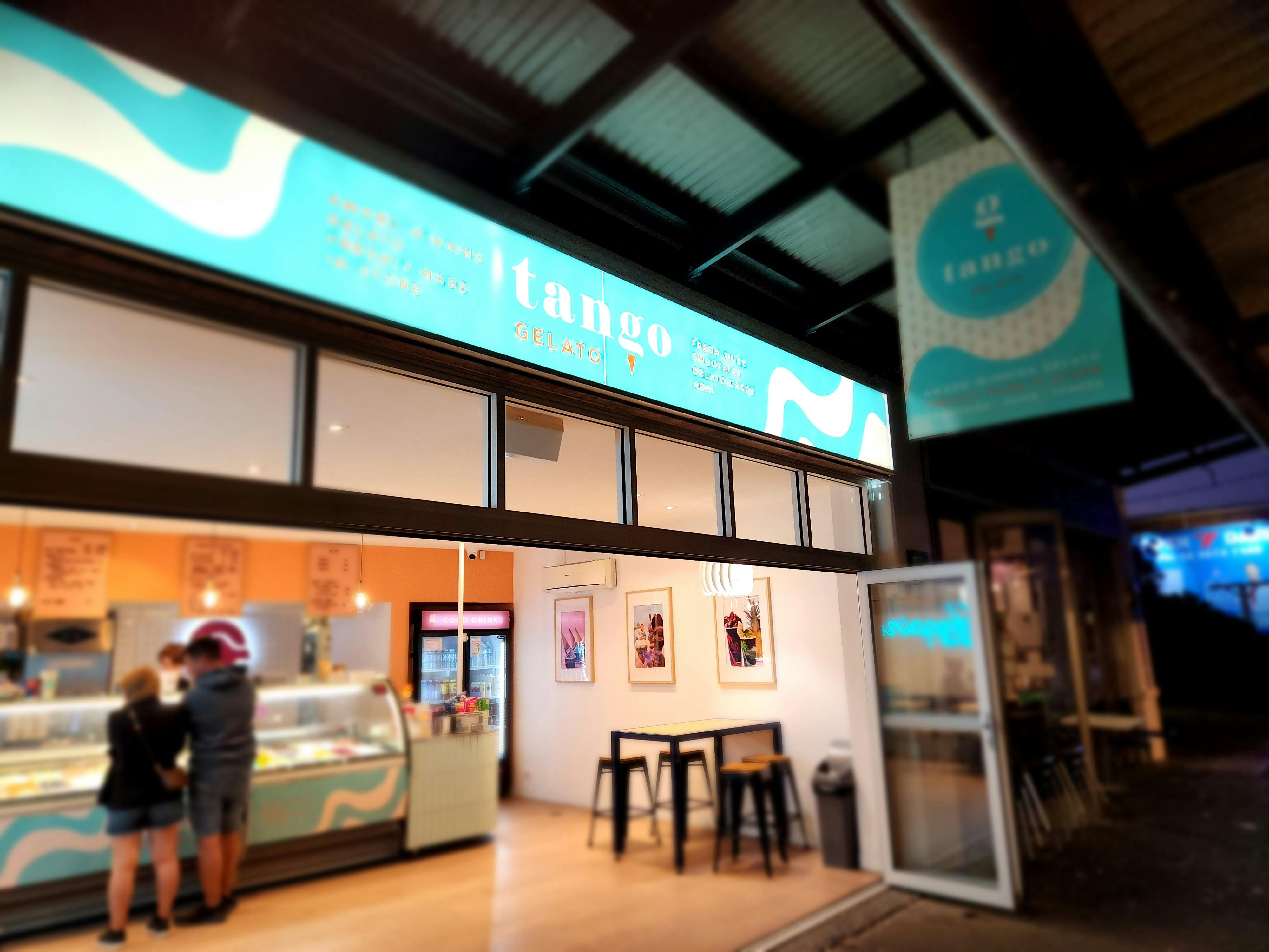 An image of the exterior of Tango Gelato, looking inside at customers selecting their gelato flavour