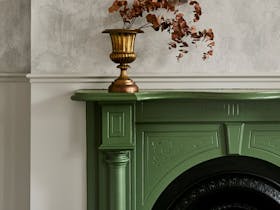 Fireplace with goblet with flowers