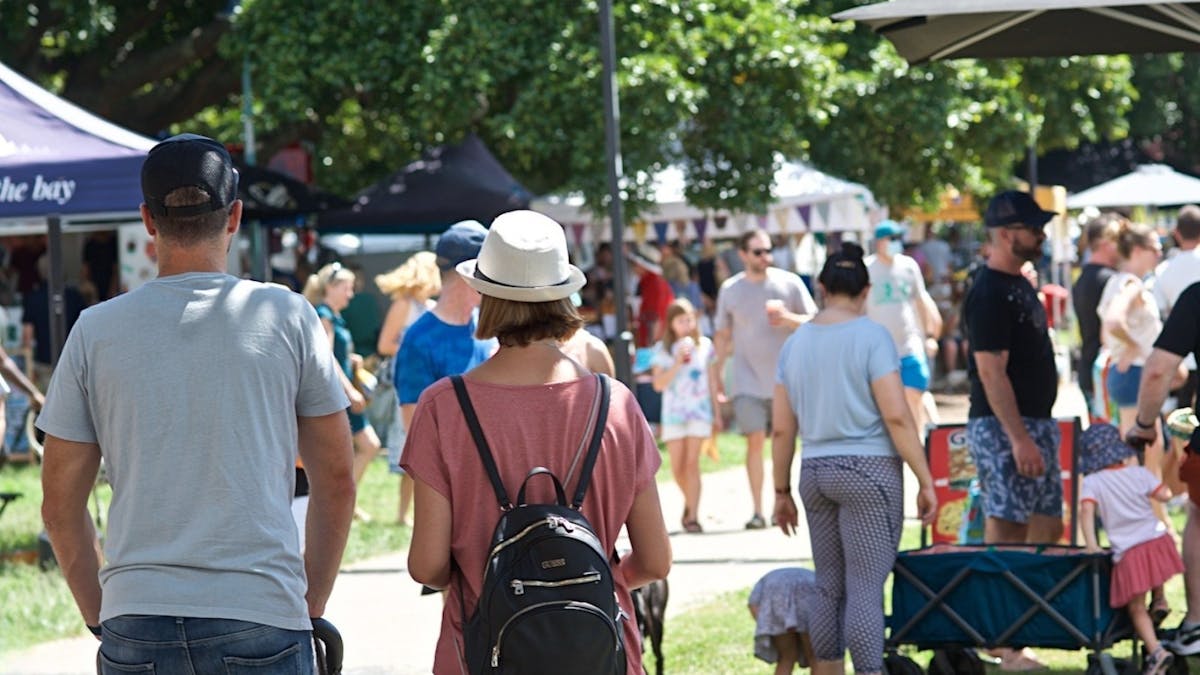 Jan Powers Farmers Markets - Couple strolling through the Manly Markets