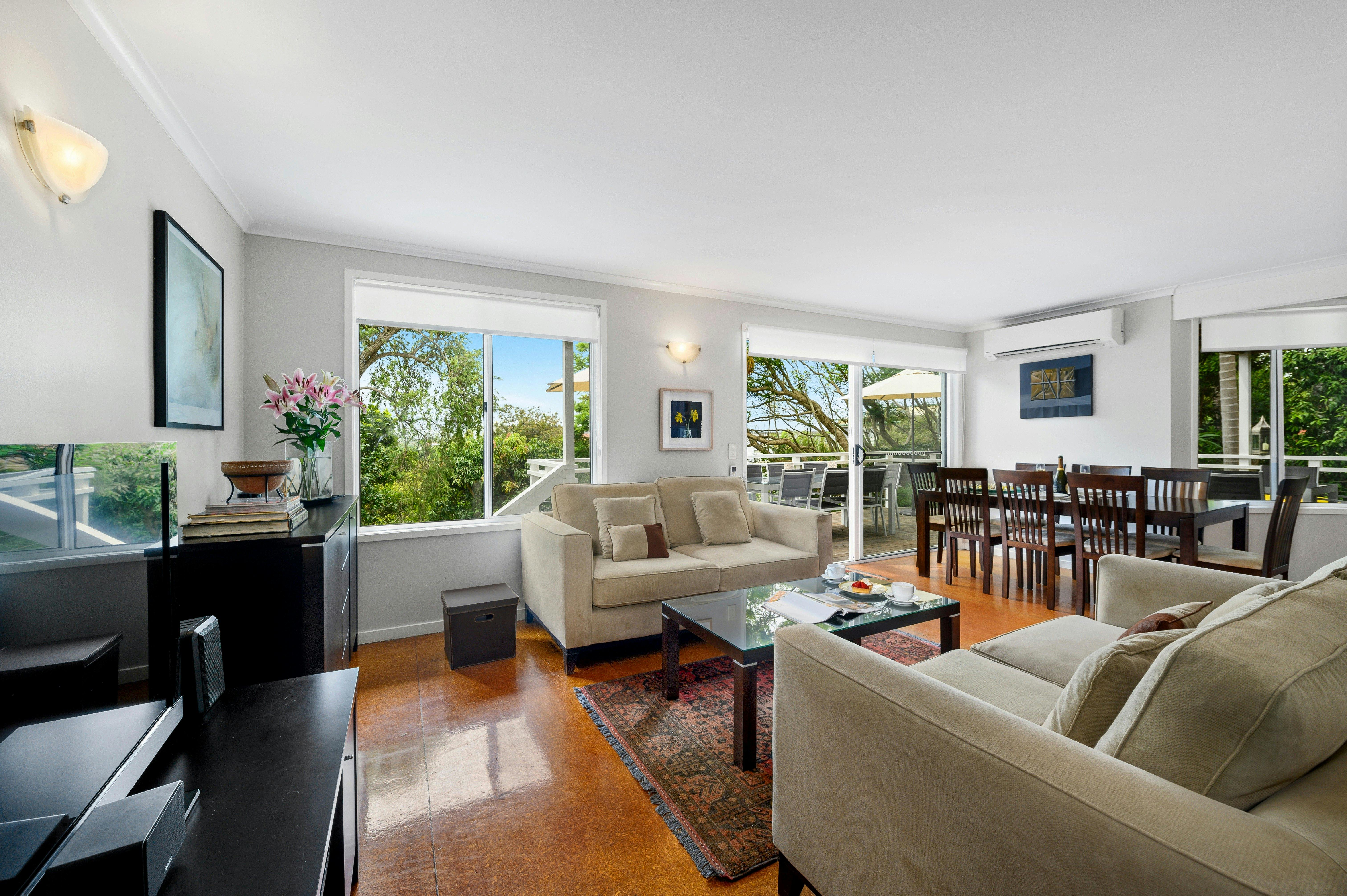 Peaceful living spaces including lounge and dining area