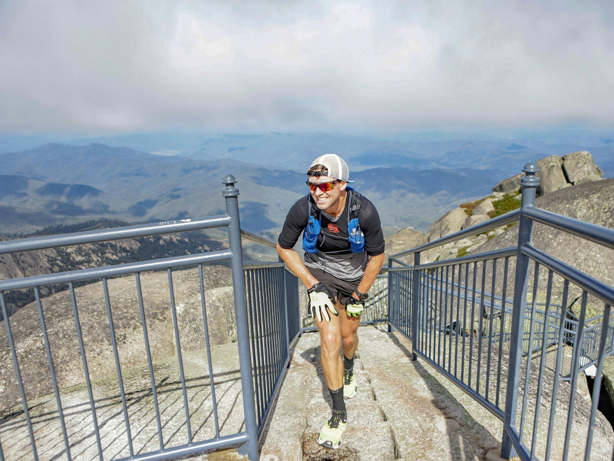 Man climbing up stairs.