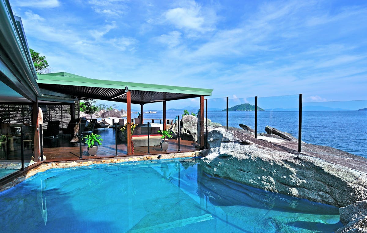 Private Natural Salt Water Rock Pool Metres From King Suite Bedroom and Great Barrier Reef