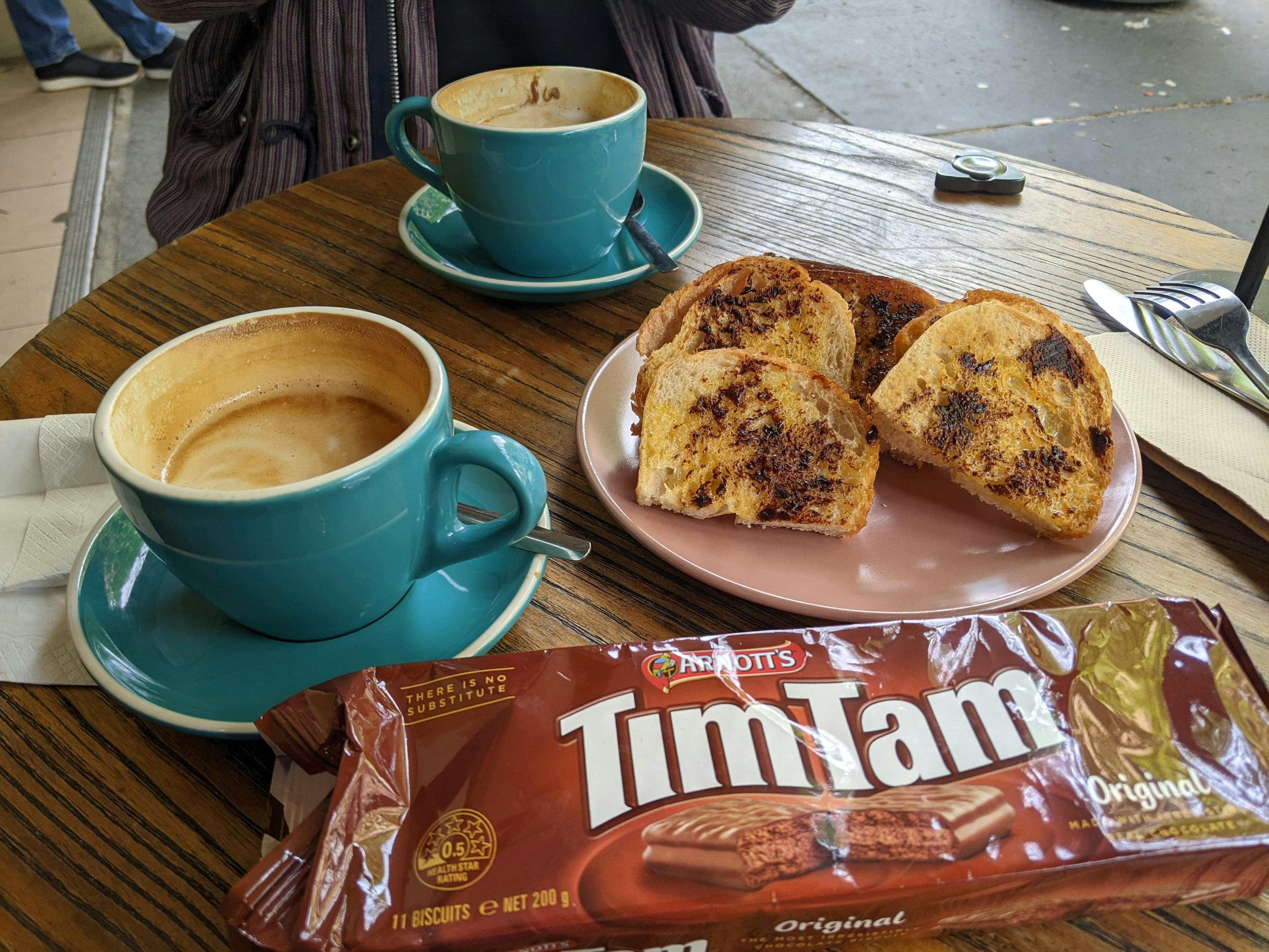 Tim Tams vegemite and flat white