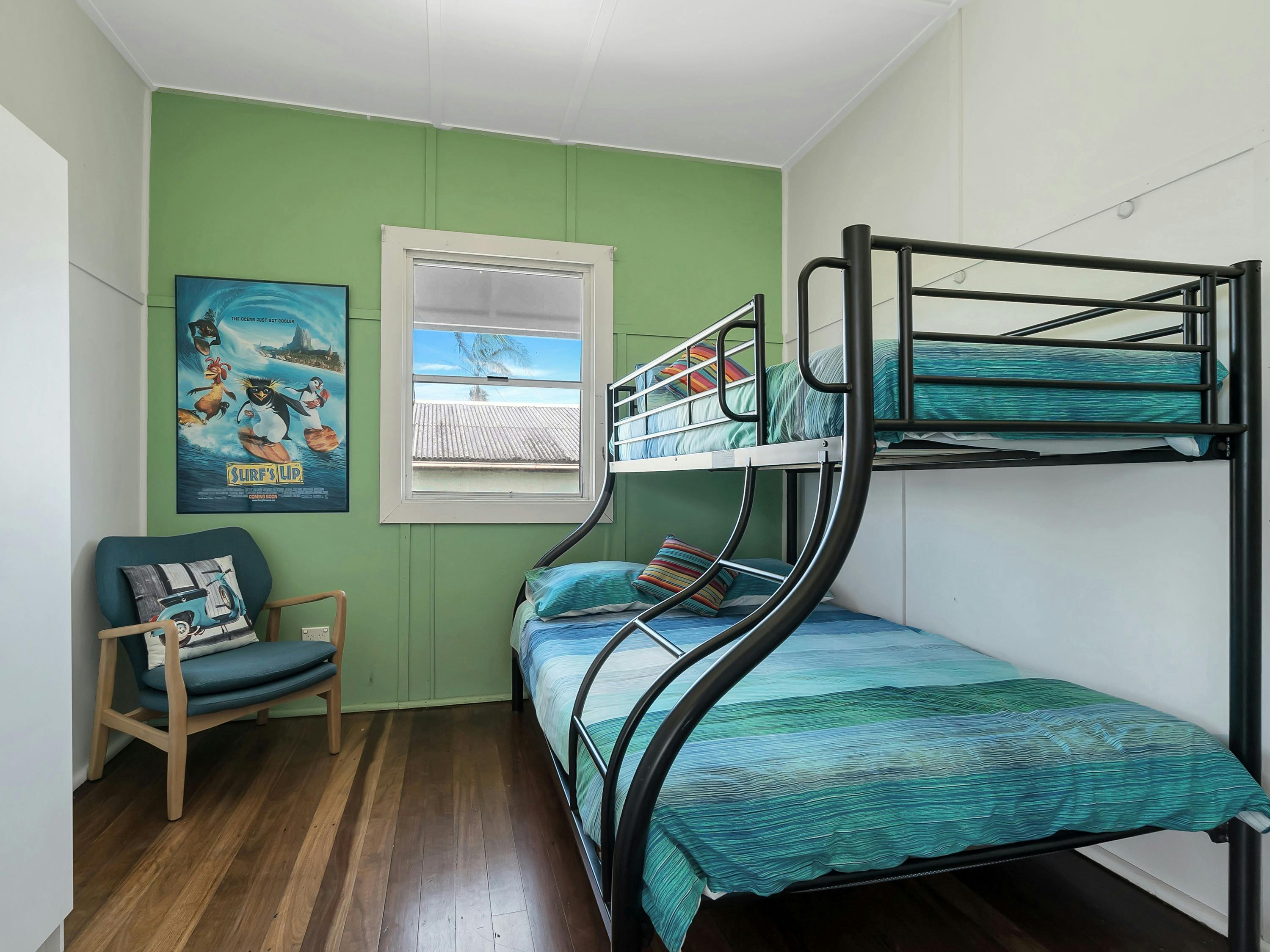 Photo of the second bedroom, offering bunk beds, with the lower bed being a double.