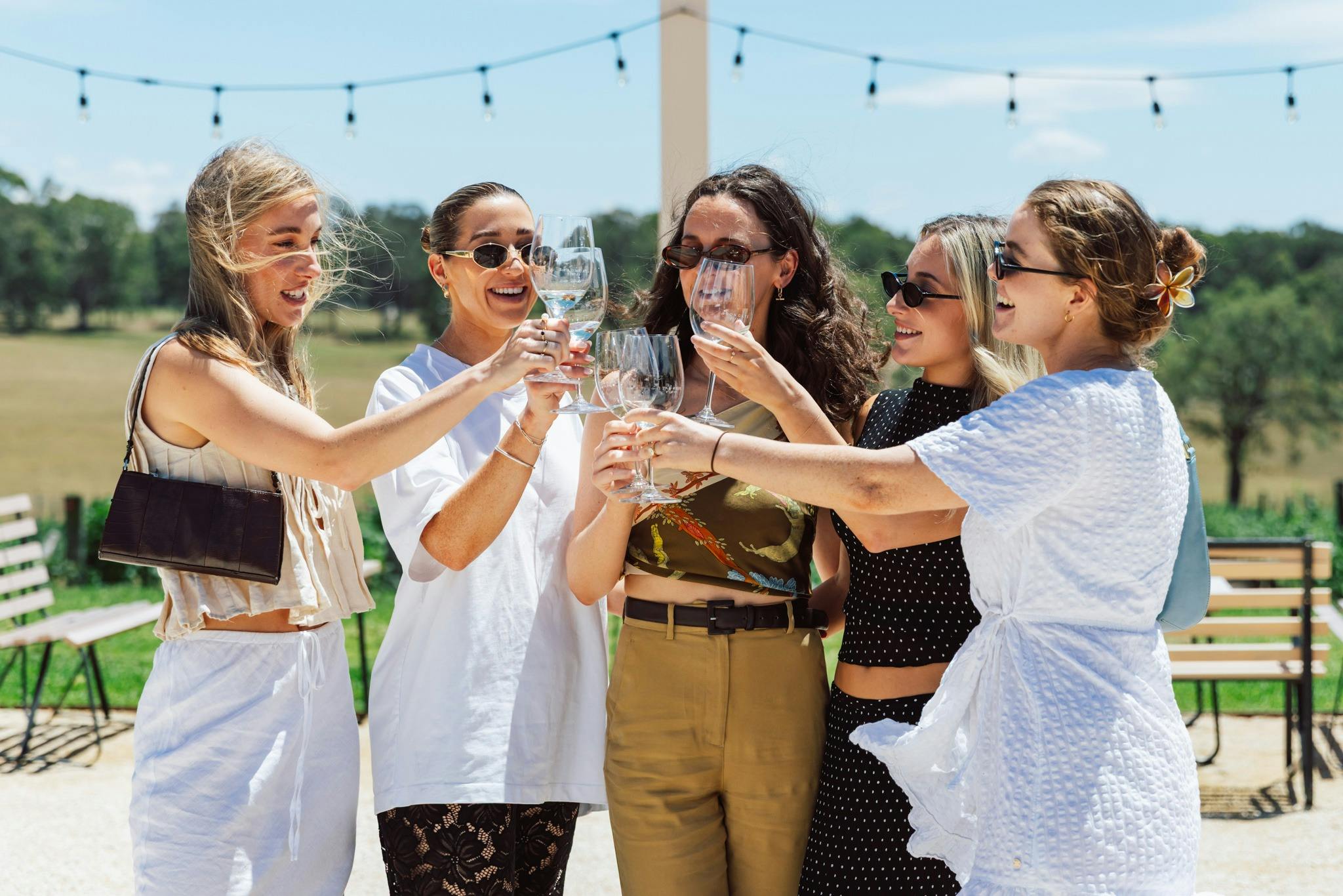 5 women enjoying a glass of wine in the hunter valley