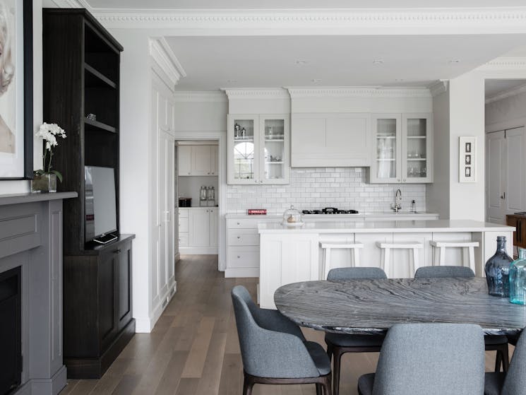 Light filled kitchen/dining area with fireplace